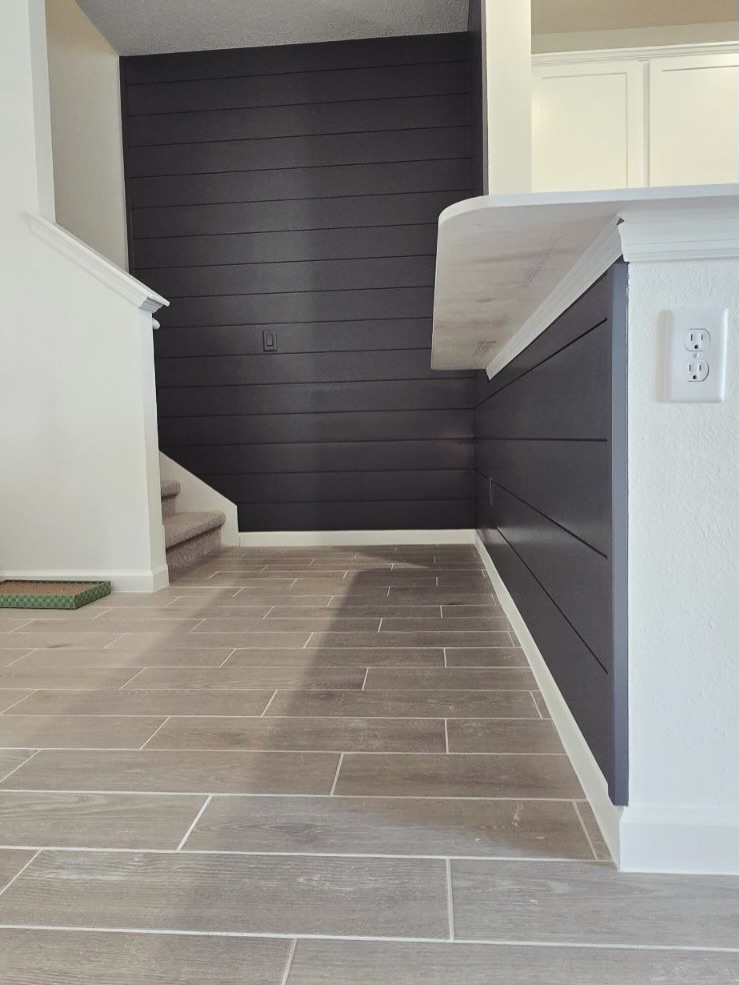 Wainscoting feature wall with chair rail by AVP Construction JAX — Jacksonville & St. John's County, FL