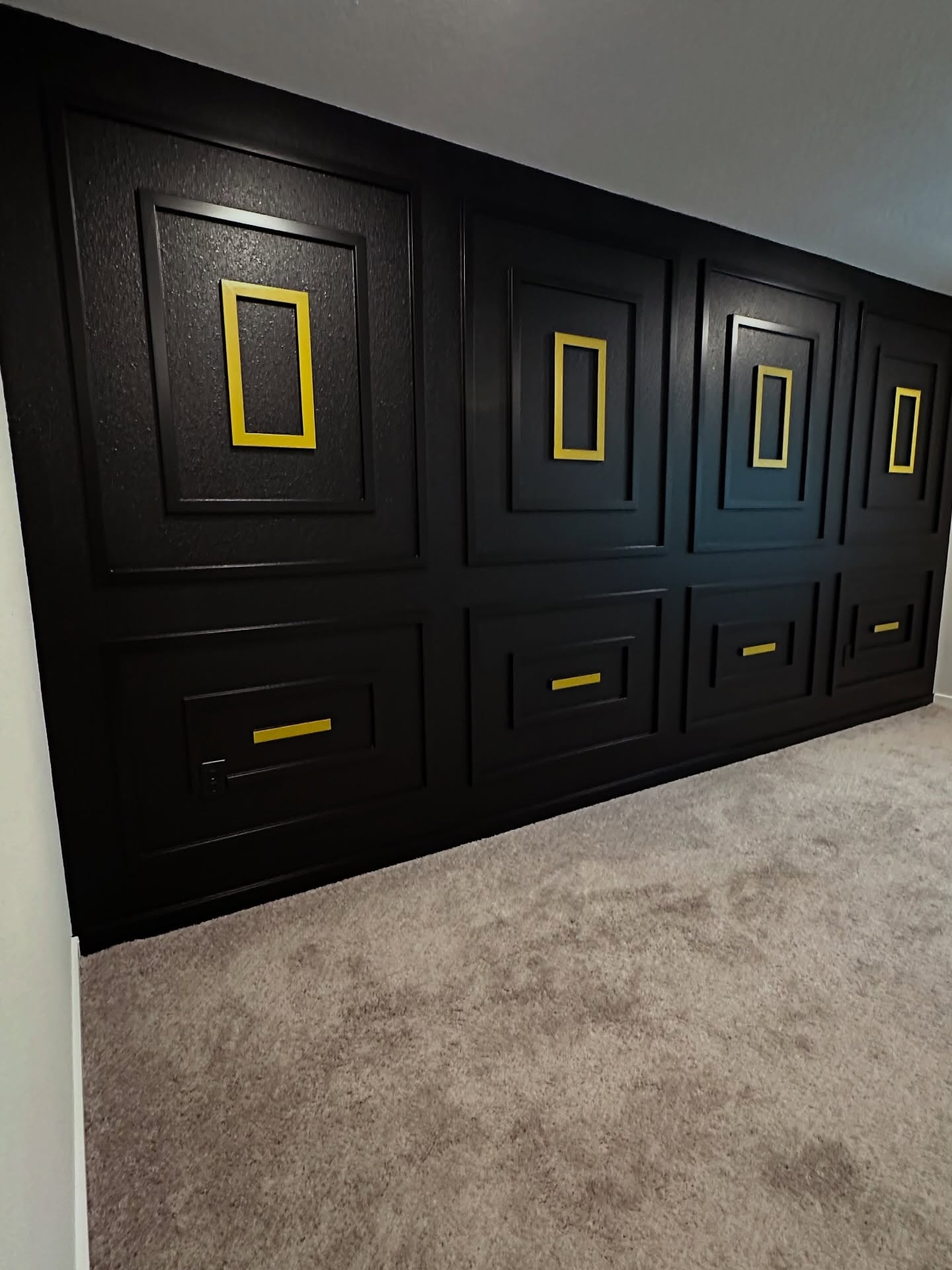 Floor-to-ceiling slat accent wall by AVP Construction JAX — Jacksonville & St. John's County, FL