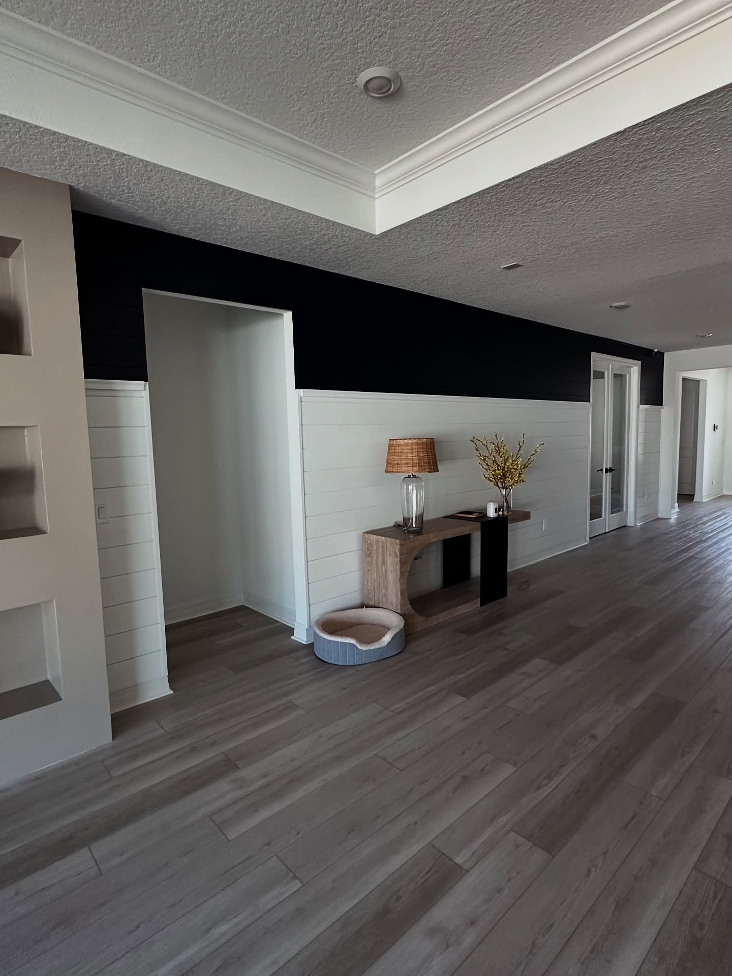 Vertical slat wood accent wall by AVP Construction JAX — Jacksonville & St. John's County, FL
