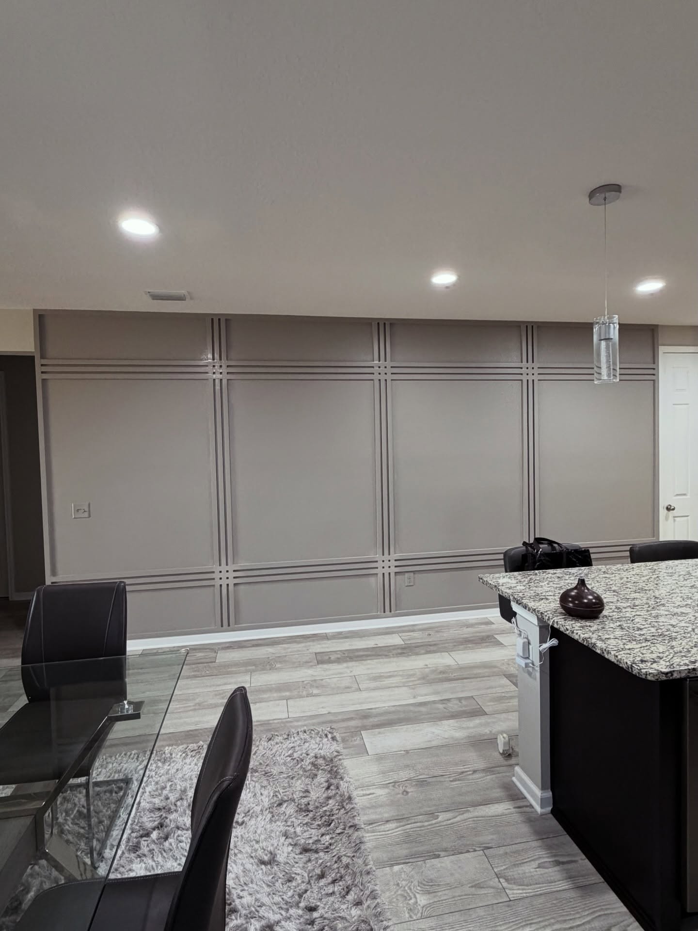 Wainscoting feature wall with chair rail by AVP Construction JAX — Jacksonville & St. John's County, FL