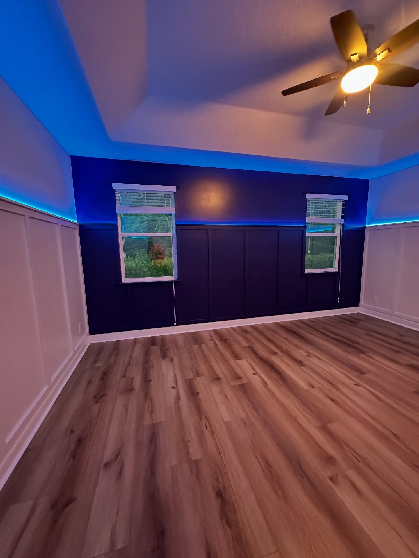 Statement bedroom accent wall in white shiplap by AVP Construction JAX — Jacksonville & St. John's County, FL