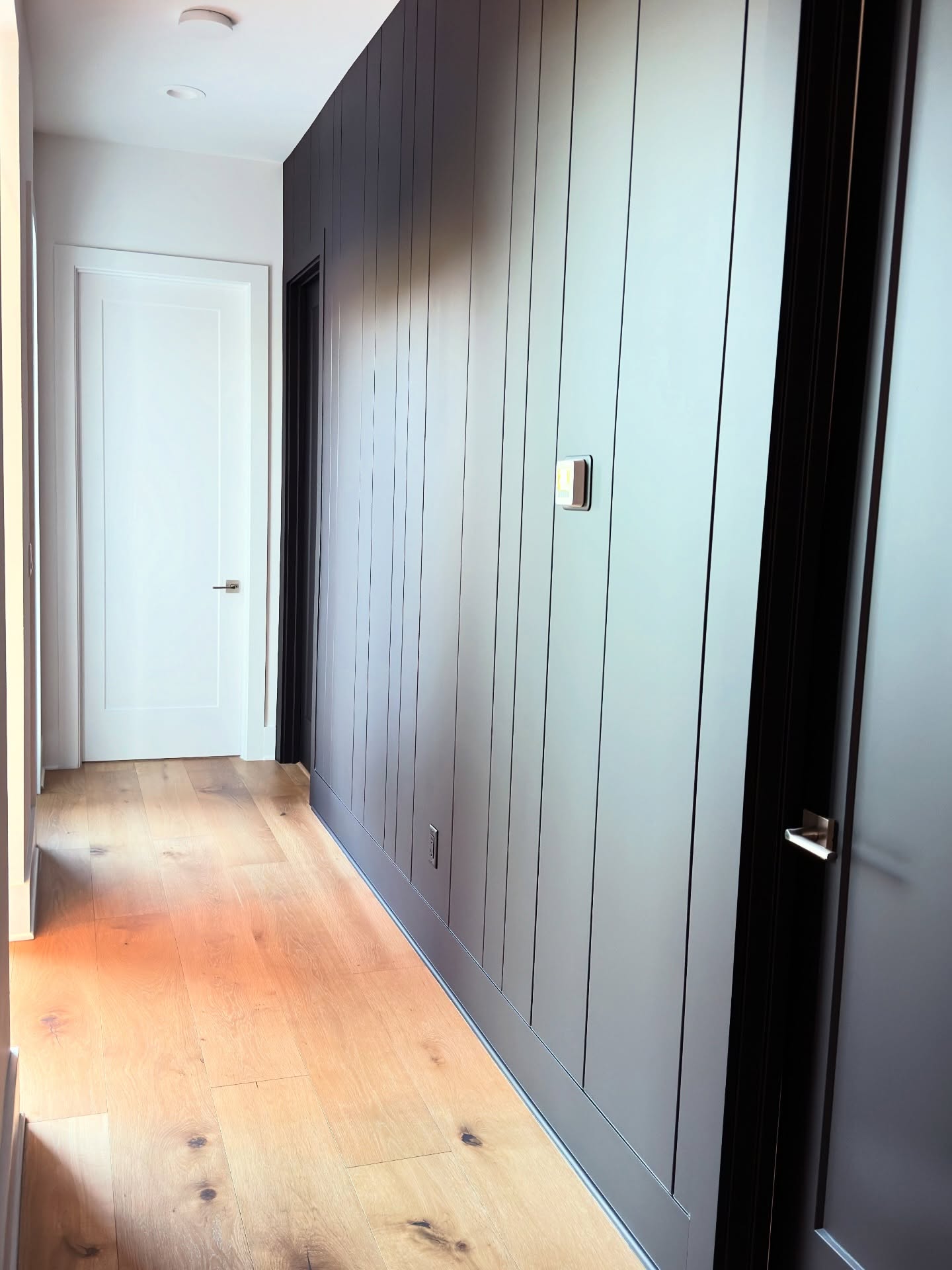 Board and batten accent wall by AVP Construction JAX — Jacksonville & St. John's County, FL