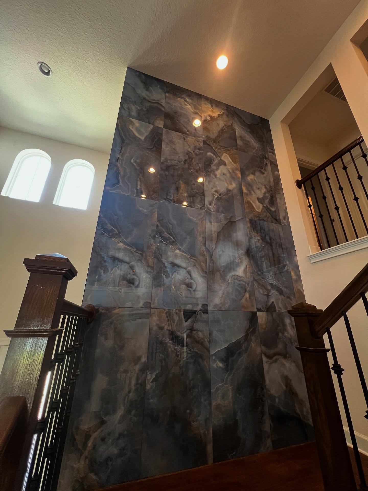 Vertical slat wood accent wall by AVP Construction JAX — Jacksonville & St. John's County, FL