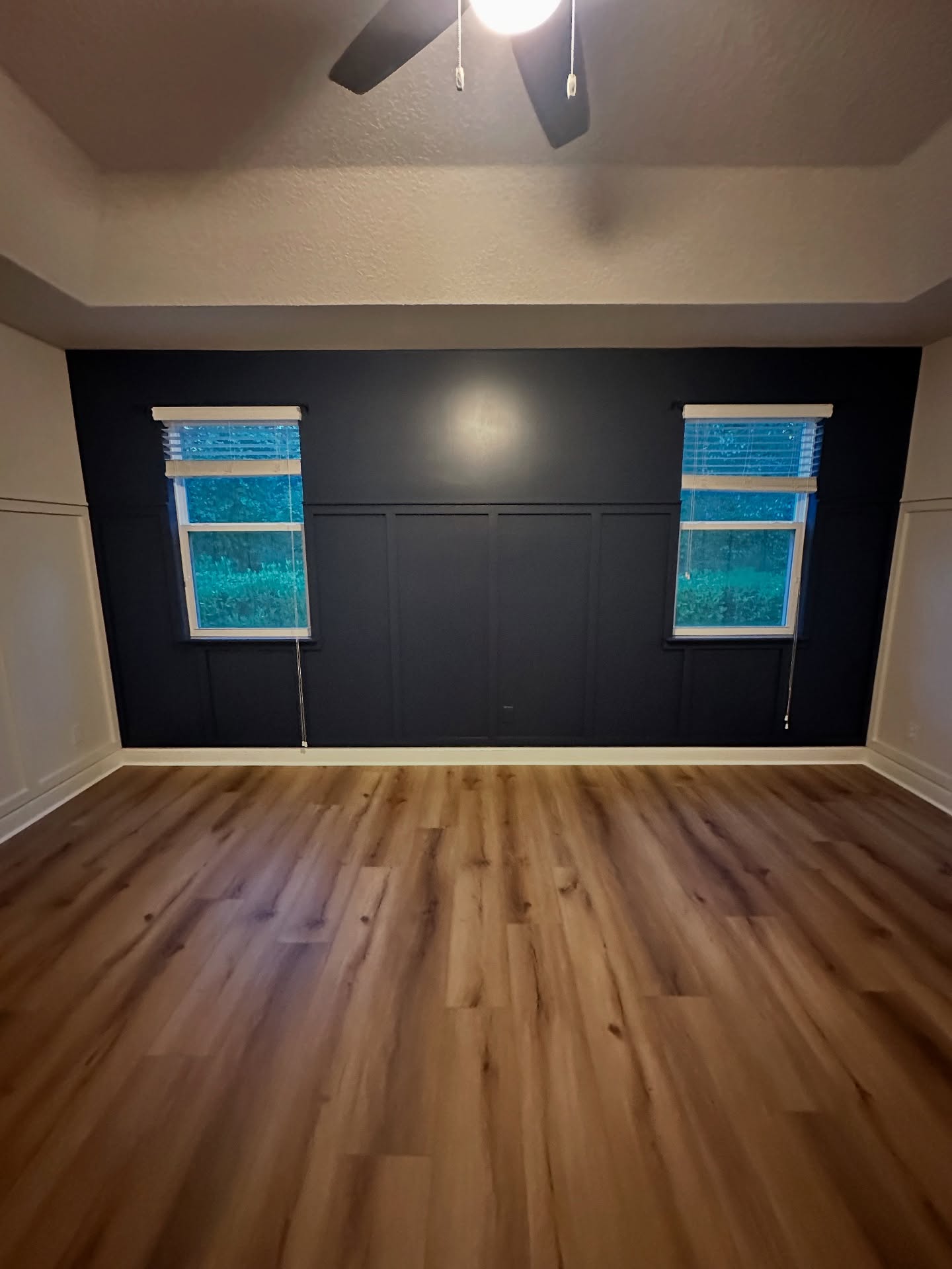 Modern fluted wood accent wall by AVP Construction JAX — Jacksonville & St. John's County, FL