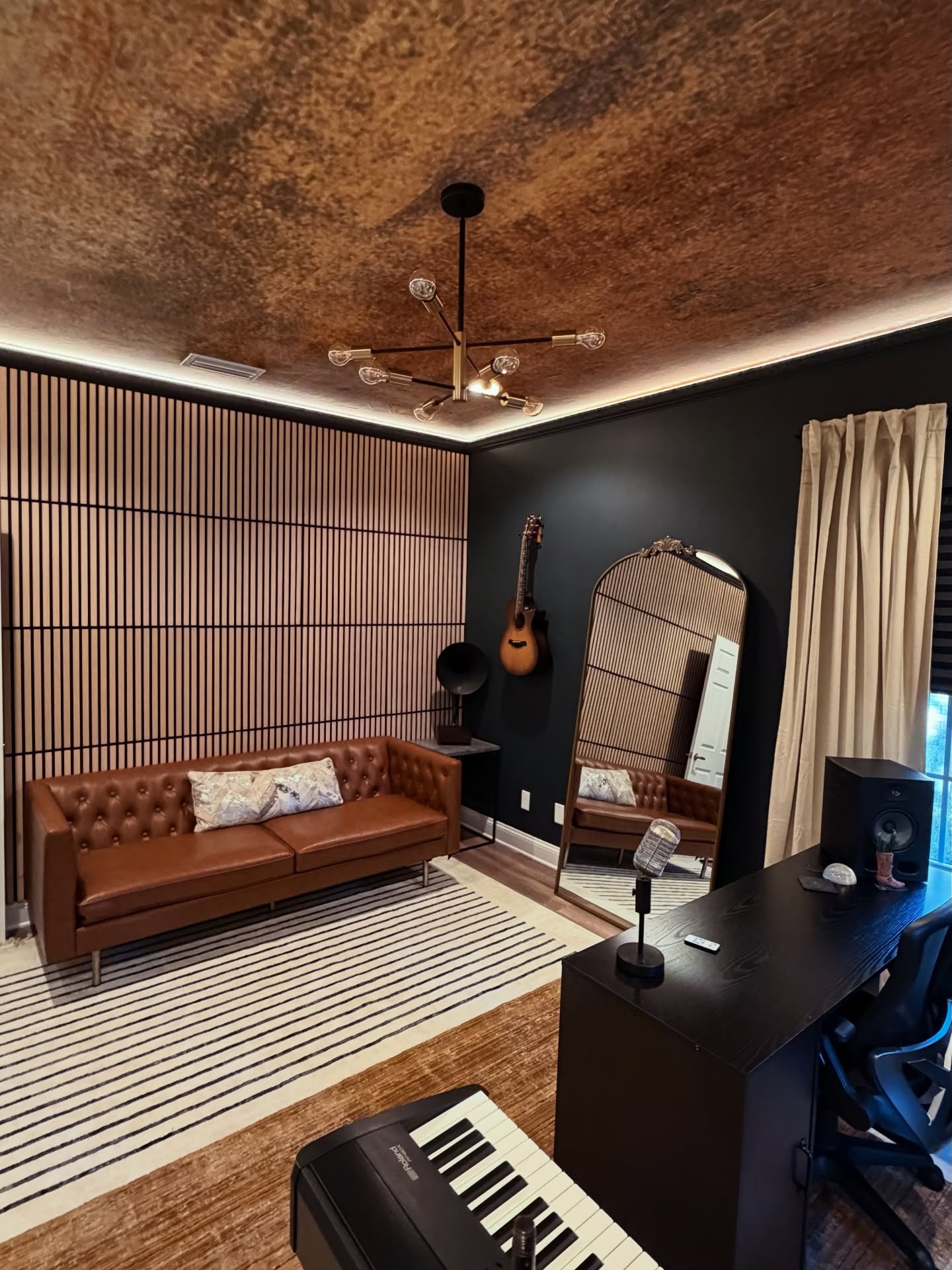 Vertical slat wood accent wall by AVP Construction JAX — Jacksonville & St. John's County, FL