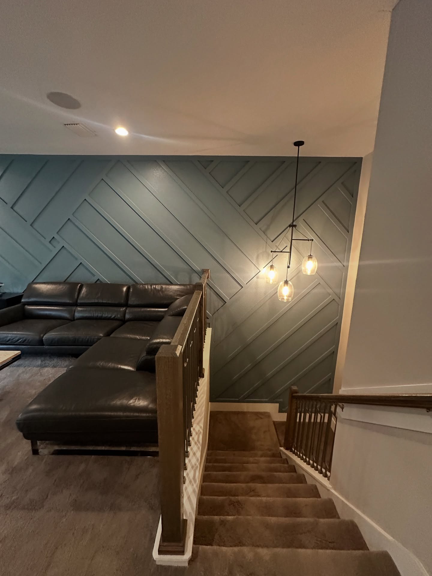 Statement bedroom accent wall in white shiplap by AVP Construction JAX — Jacksonville & St. John's County, FL