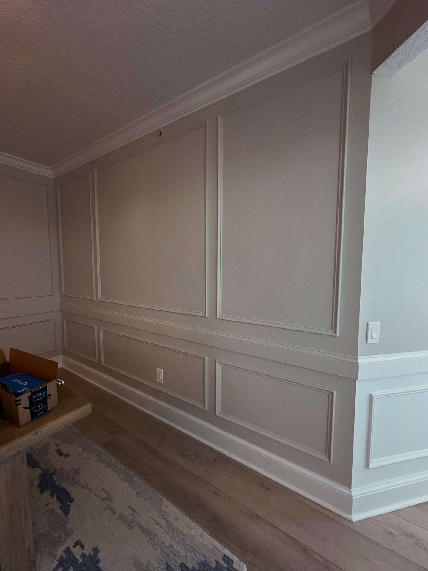 Vertical slat wood accent wall by AVP Construction JAX — Jacksonville & St. John's County, FL