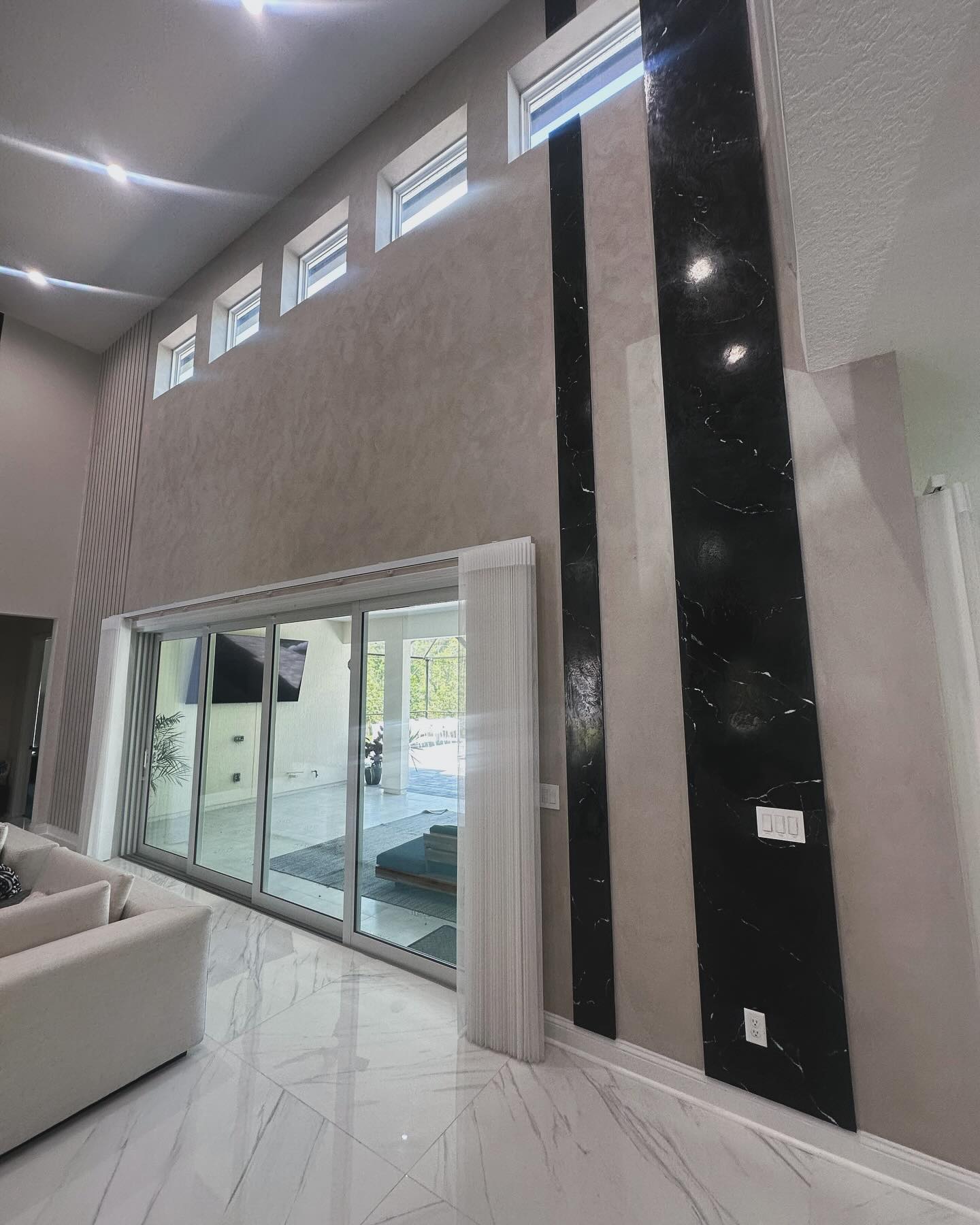 Painted shiplap feature wall by AVP Construction JAX — Jacksonville & St. John's County, FL