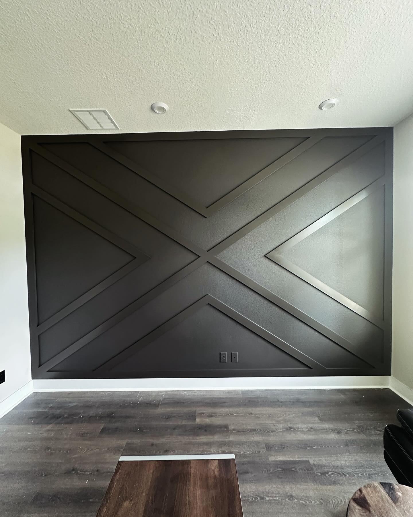Modern fluted wood accent wall by AVP Construction JAX — Jacksonville & St. John's County, FL