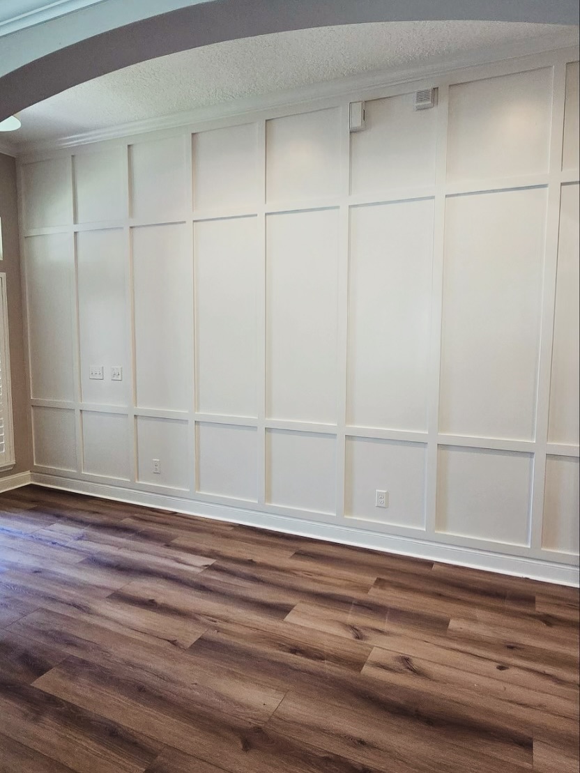Statement bedroom accent wall in white shiplap by AVP Construction JAX — Jacksonville & St. John's County, FL