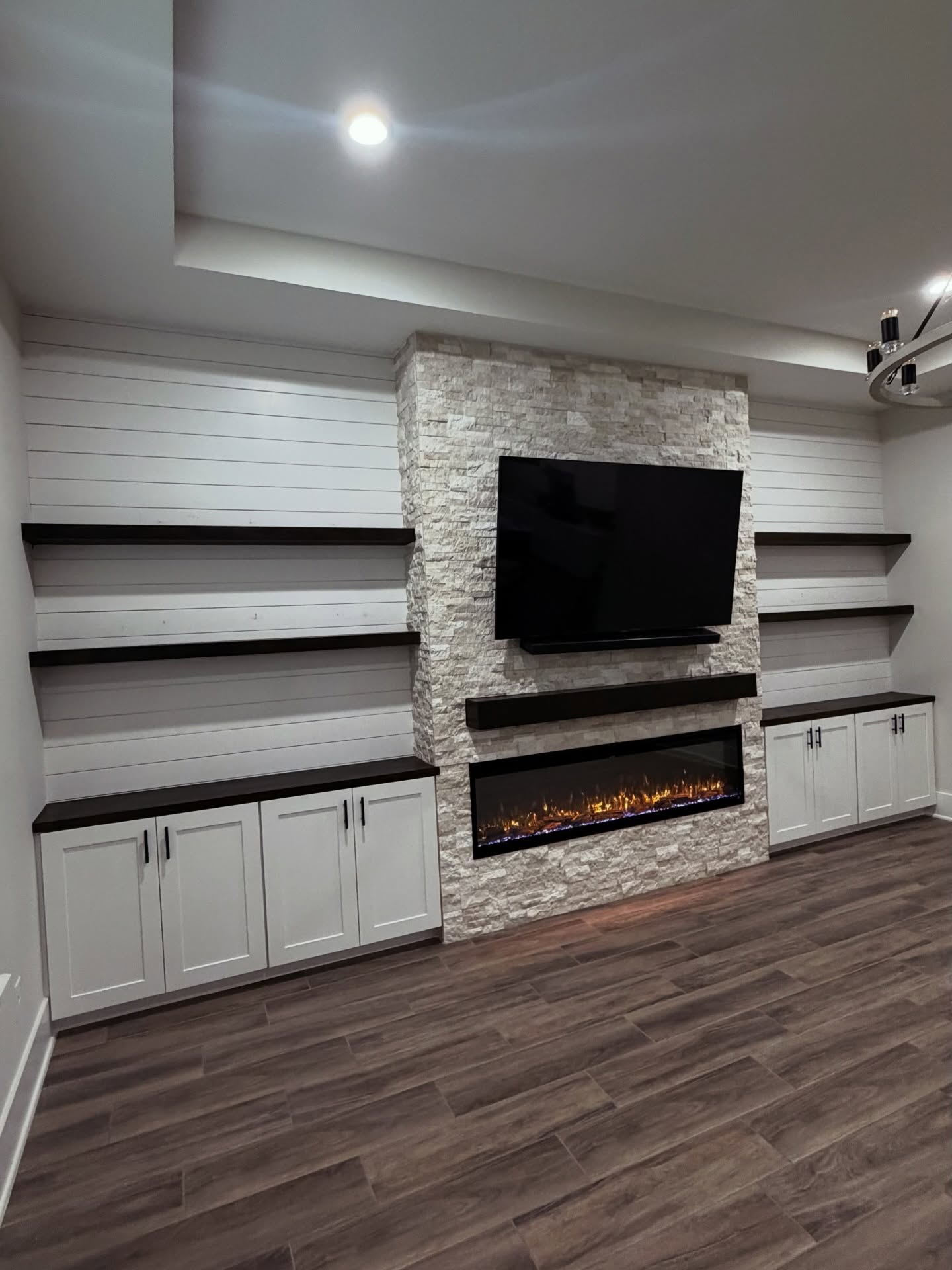 Vertical slat wood accent wall by AVP Construction JAX — Jacksonville & St. John's County, FL