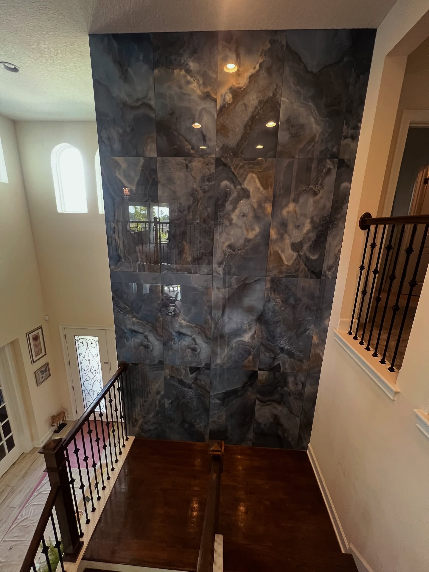 Modern fluted wood accent wall by AVP Construction JAX — Jacksonville & St. John's County, FL