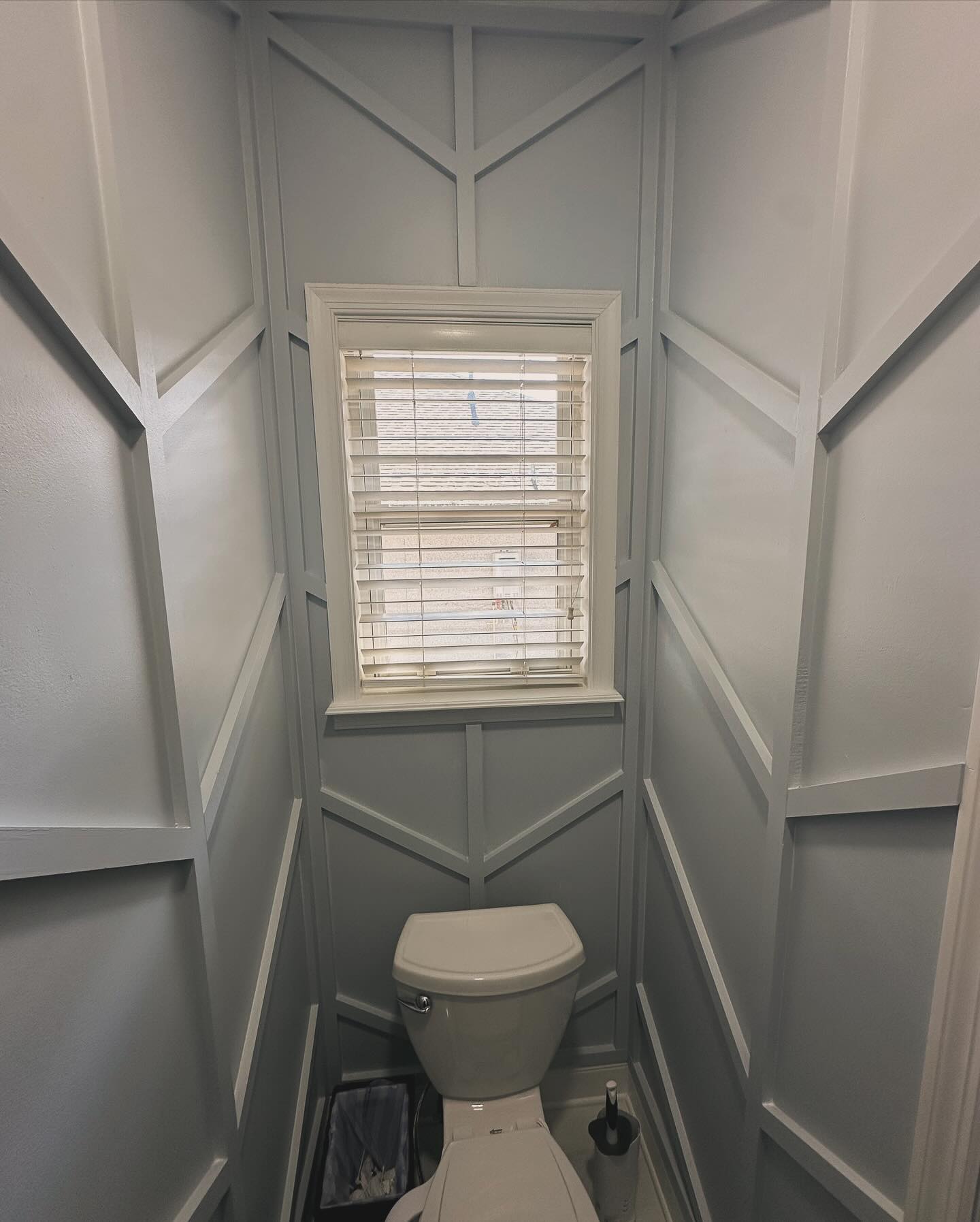 Wainscoting feature wall with chair rail by AVP Construction JAX — Jacksonville & St. John's County, FL