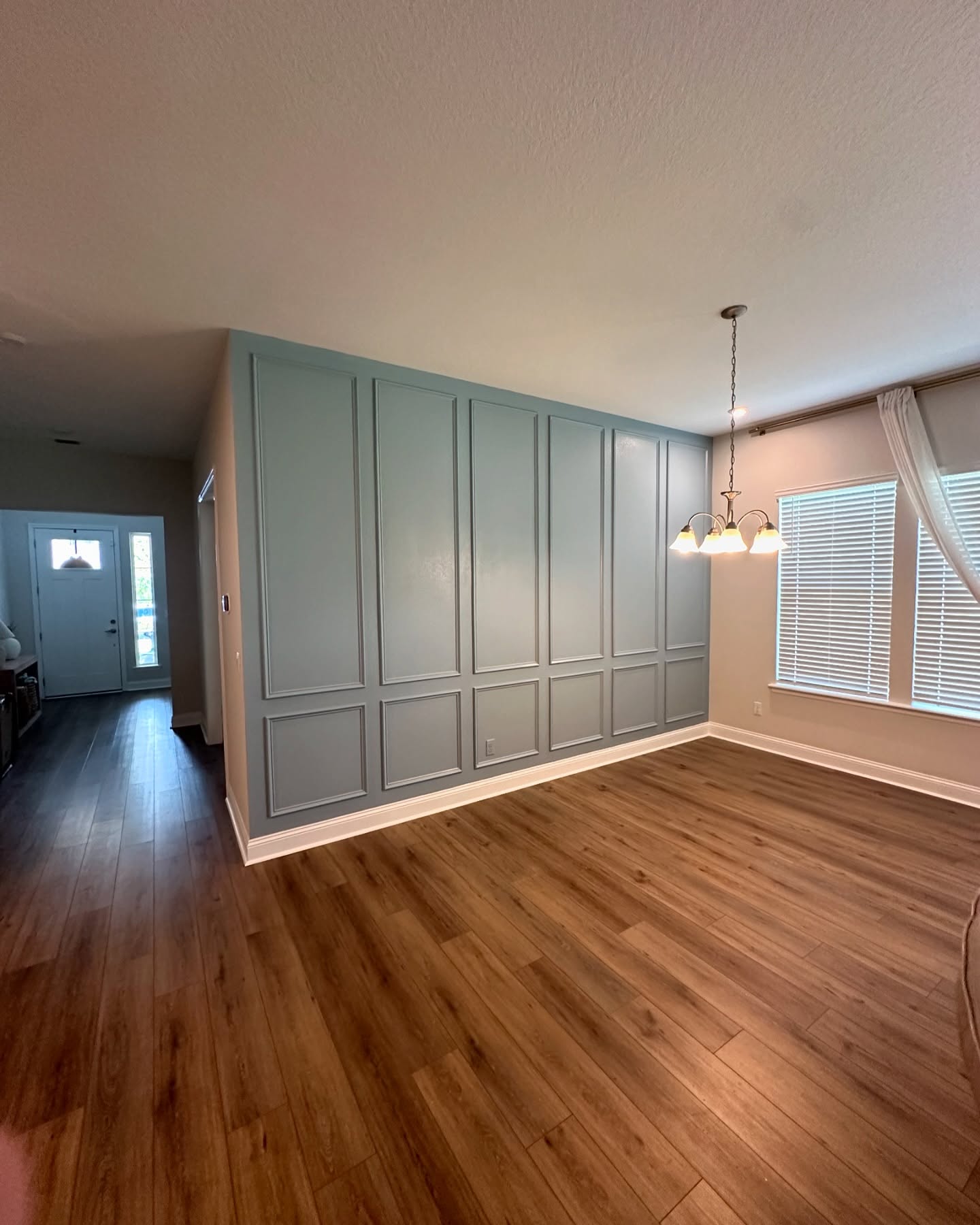 Statement bedroom accent wall in white shiplap by AVP Construction JAX — Jacksonville & St. John's County, FL