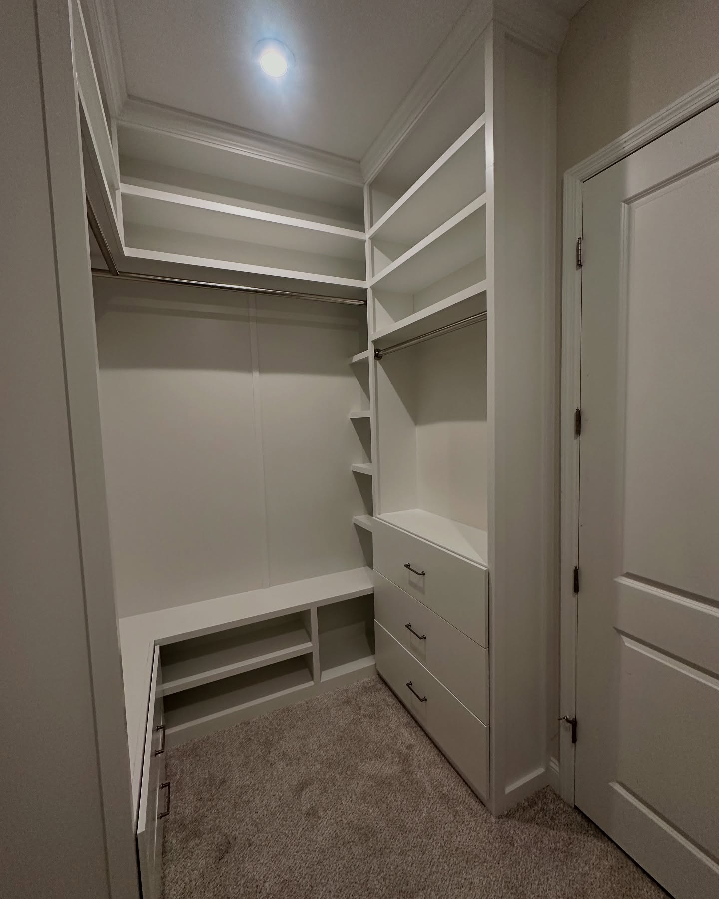 Custom closet system with drawers and hanging by AVP Construction JAX — Jacksonville & St. John's County, FL