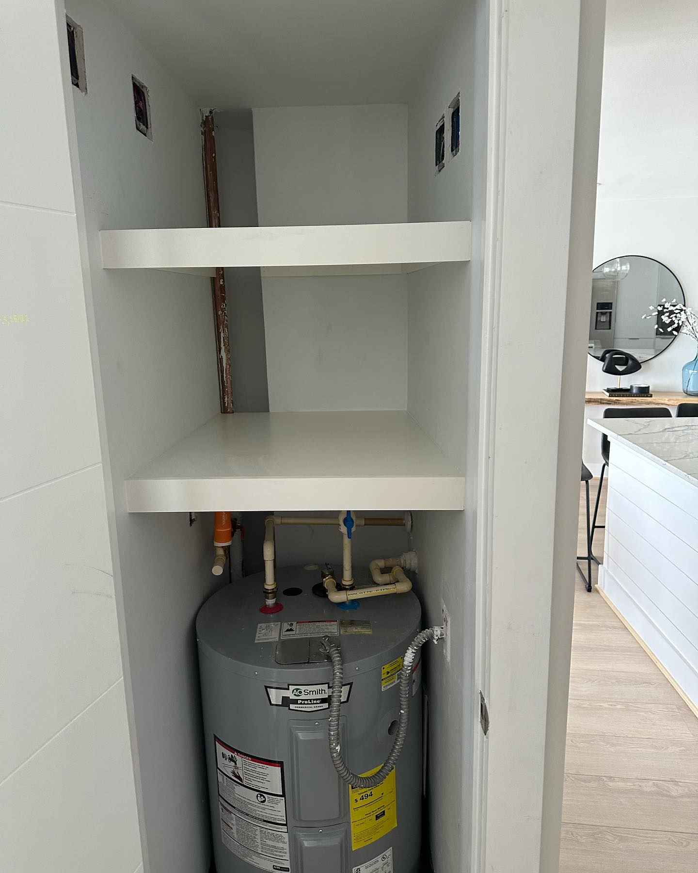 His-and-hers walk-in closet build-out by AVP Construction JAX — Jacksonville & St. John's County, FL