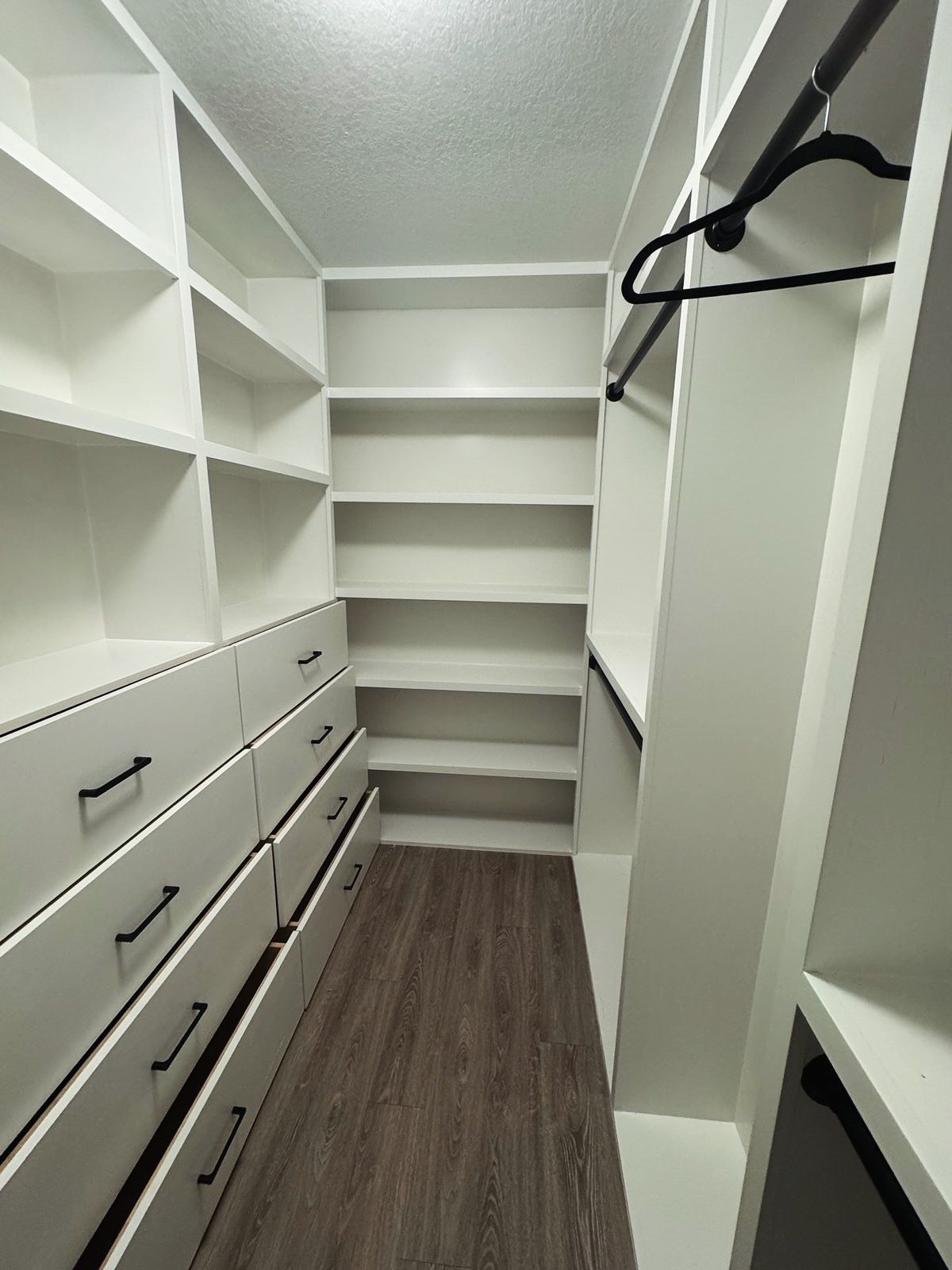 Wardrobe-style custom closet by AVP Construction JAX — Jacksonville & St. John's County, FL