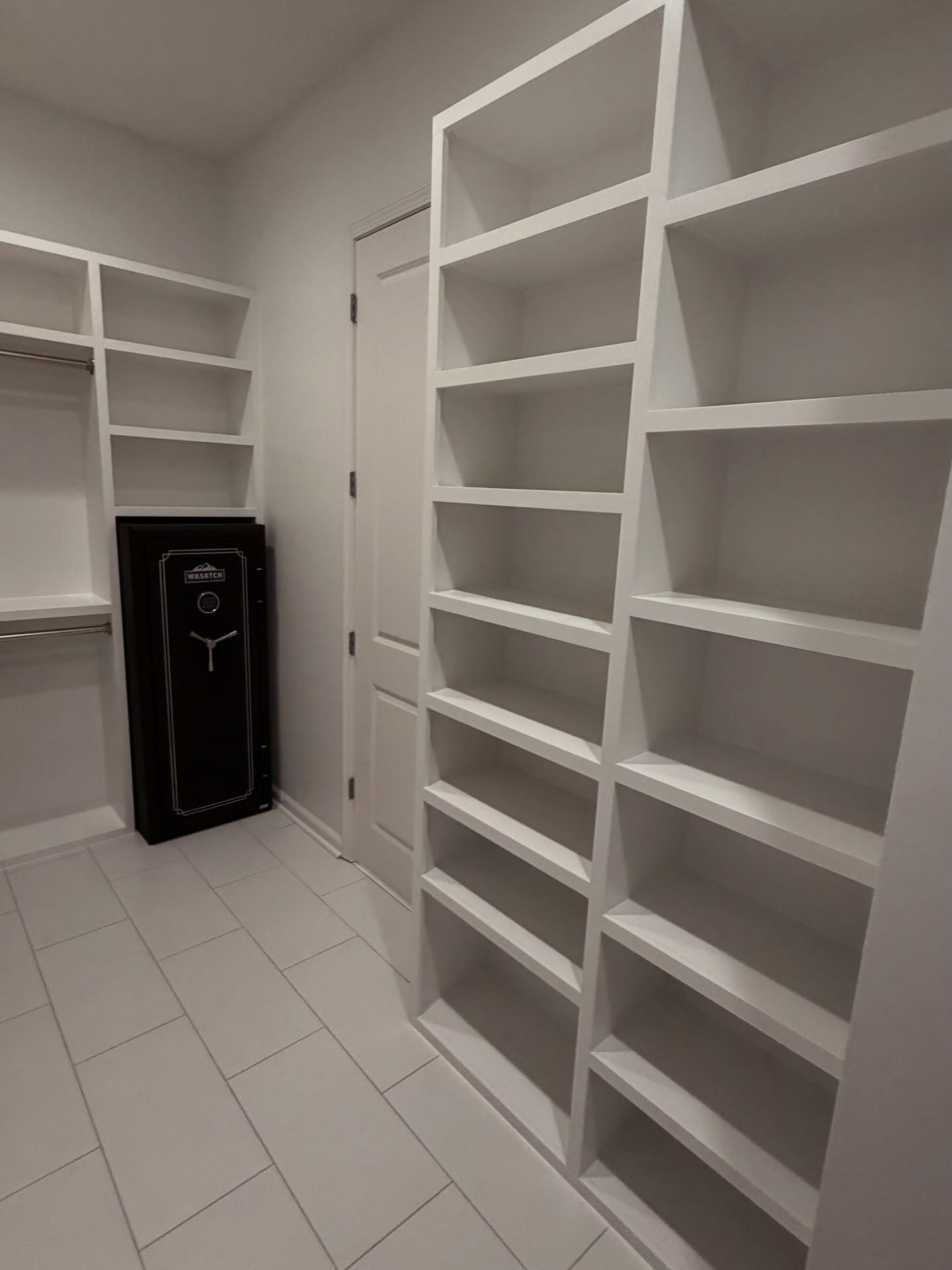 Custom walk-in closet built-in by AVP Construction JAX — Jacksonville & St. John's County, FL
