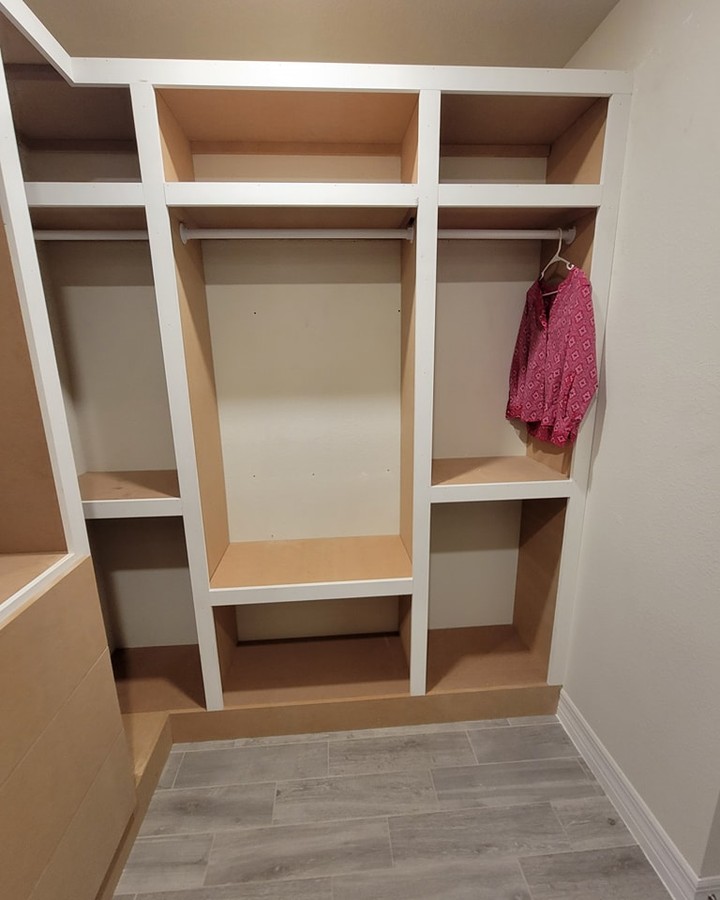 His-and-hers walk-in closet build-out by AVP Construction JAX — Jacksonville & St. John's County, FL