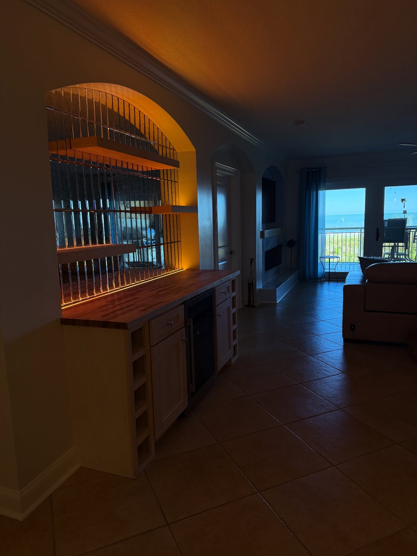 Custom dry bar with floating shelves by AVP Construction JAX — Jacksonville & St. John's County, FL