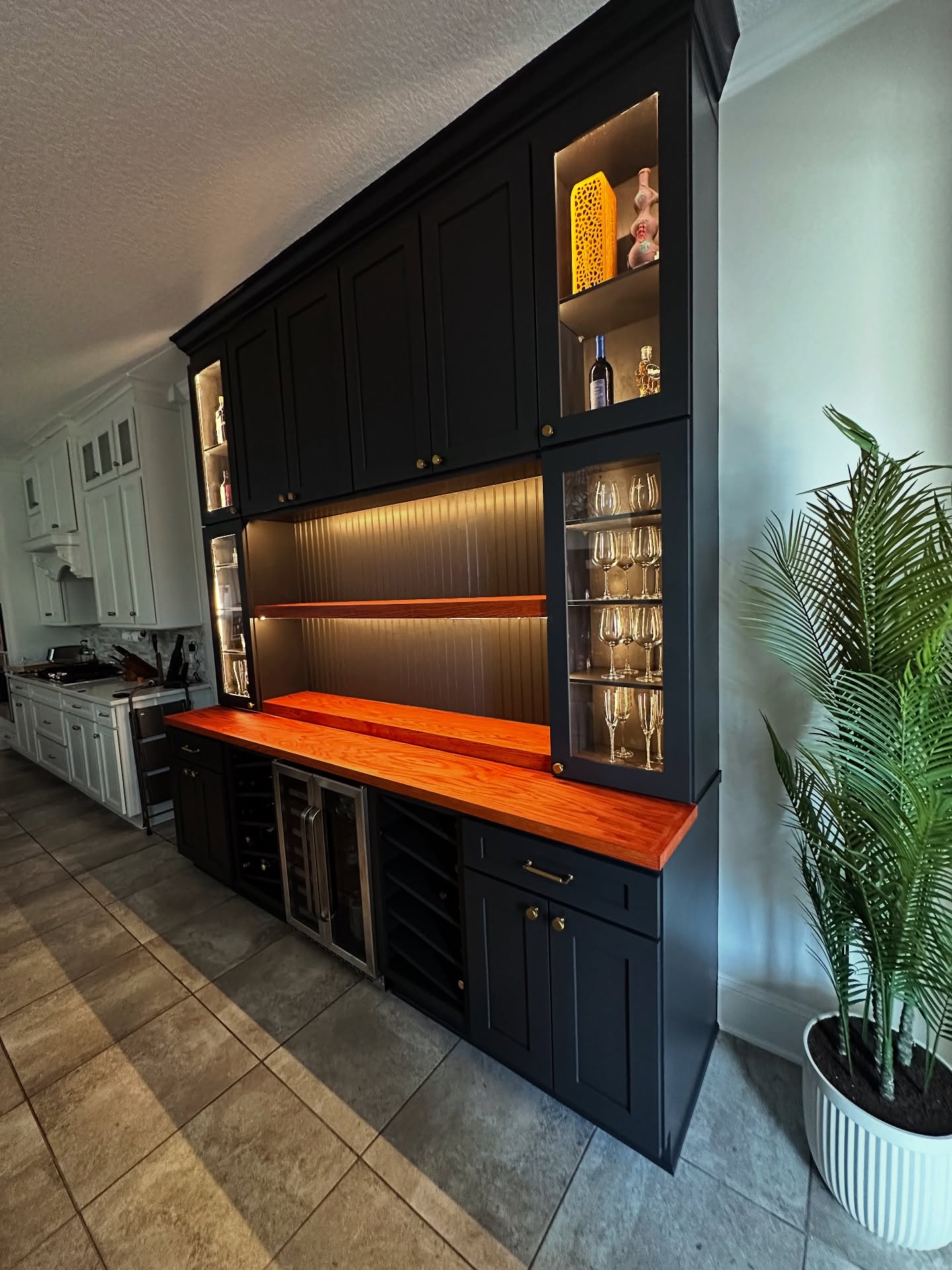 Custom dry bar with floating shelves by AVP Construction JAX — Jacksonville & St. John's County, FL