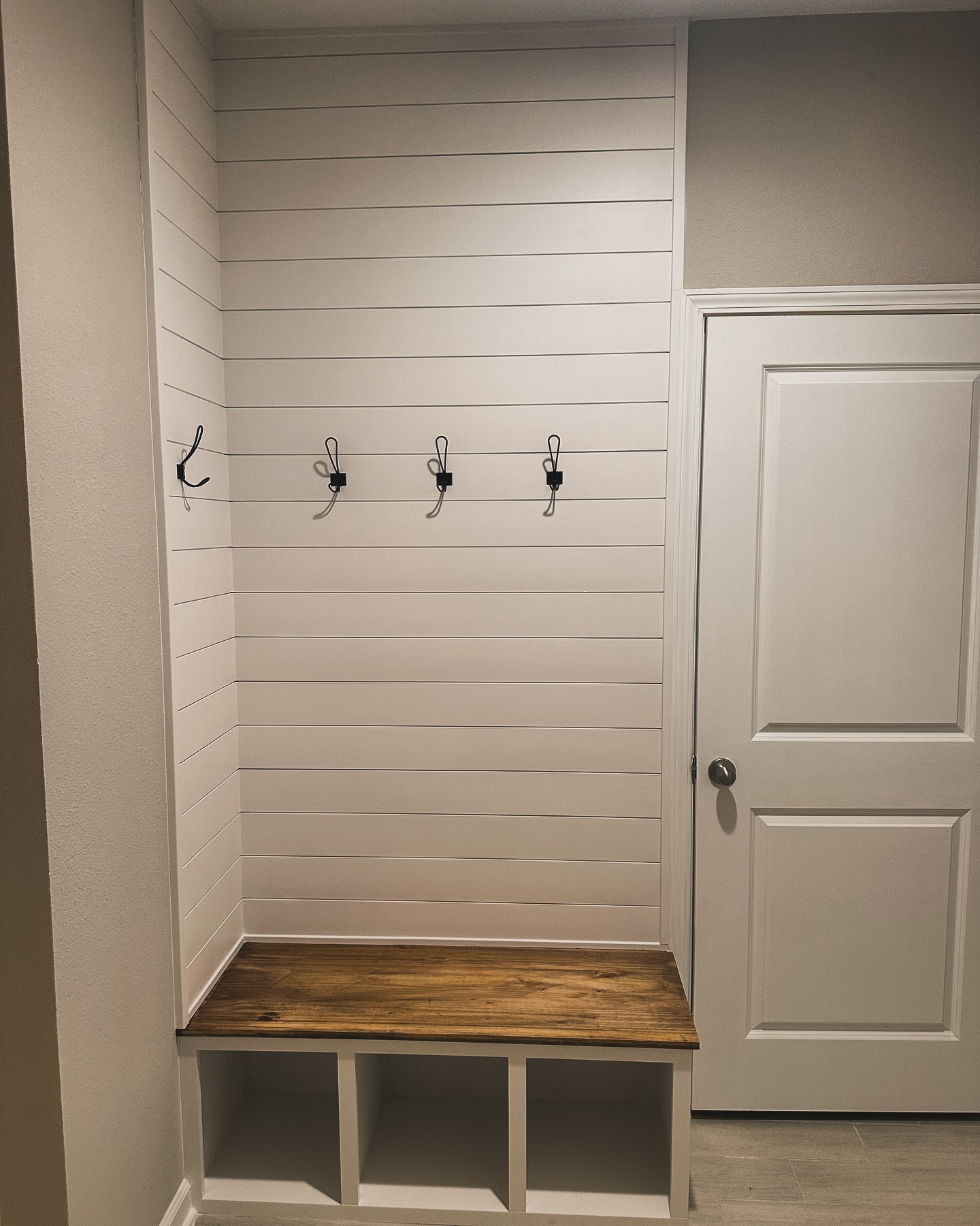 Built-in laundry room with folding counter by AVP Construction JAX — Jacksonville & St. John's County, FL