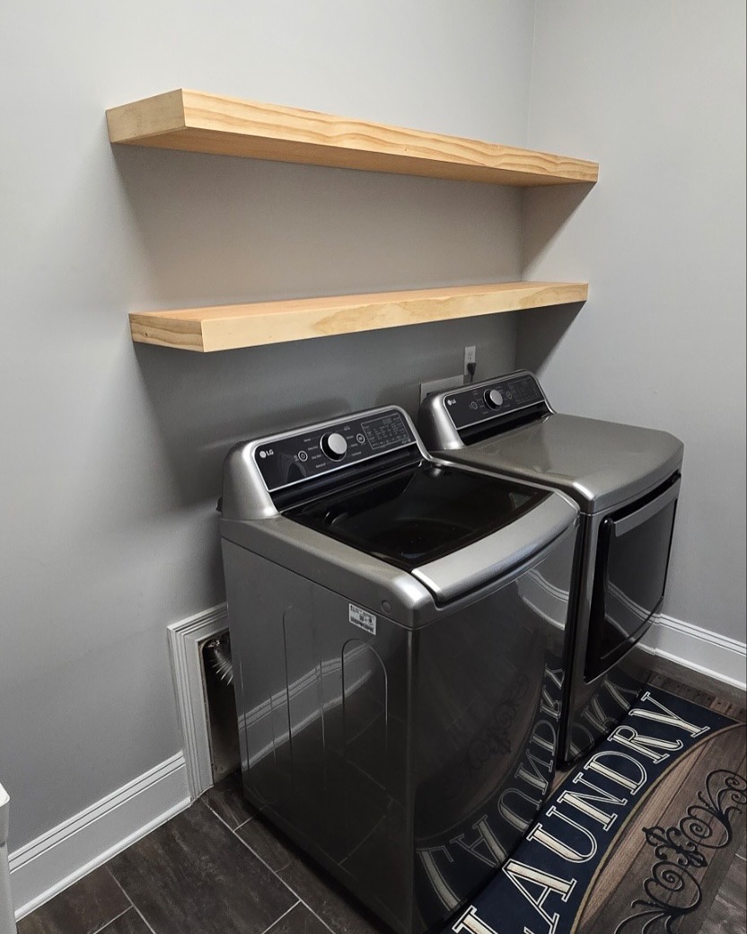 Laundry room millwork with upper cabinets by AVP Construction JAX — Jacksonville & St. John's County, FL