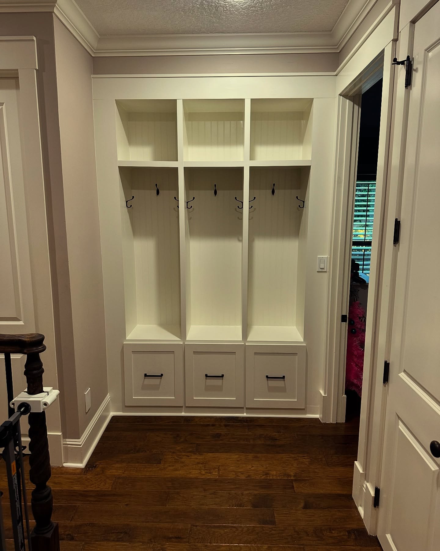 Custom mudroom with shoe storage and bench by AVP Construction JAX — Jacksonville & St. John's County, FL