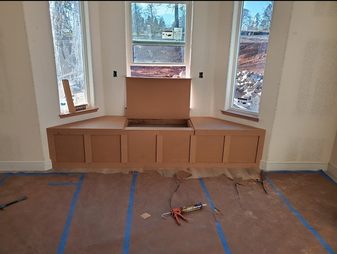 Home office wall of shelves and drawers by AVP Construction JAX — Jacksonville & St. John's County, FL
