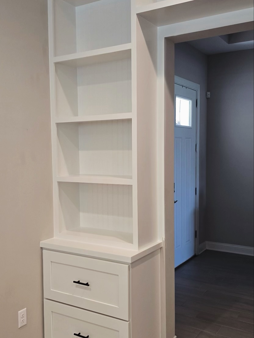 Office credenza and upper shelving by AVP Construction JAX — Jacksonville & St. John's County, FL