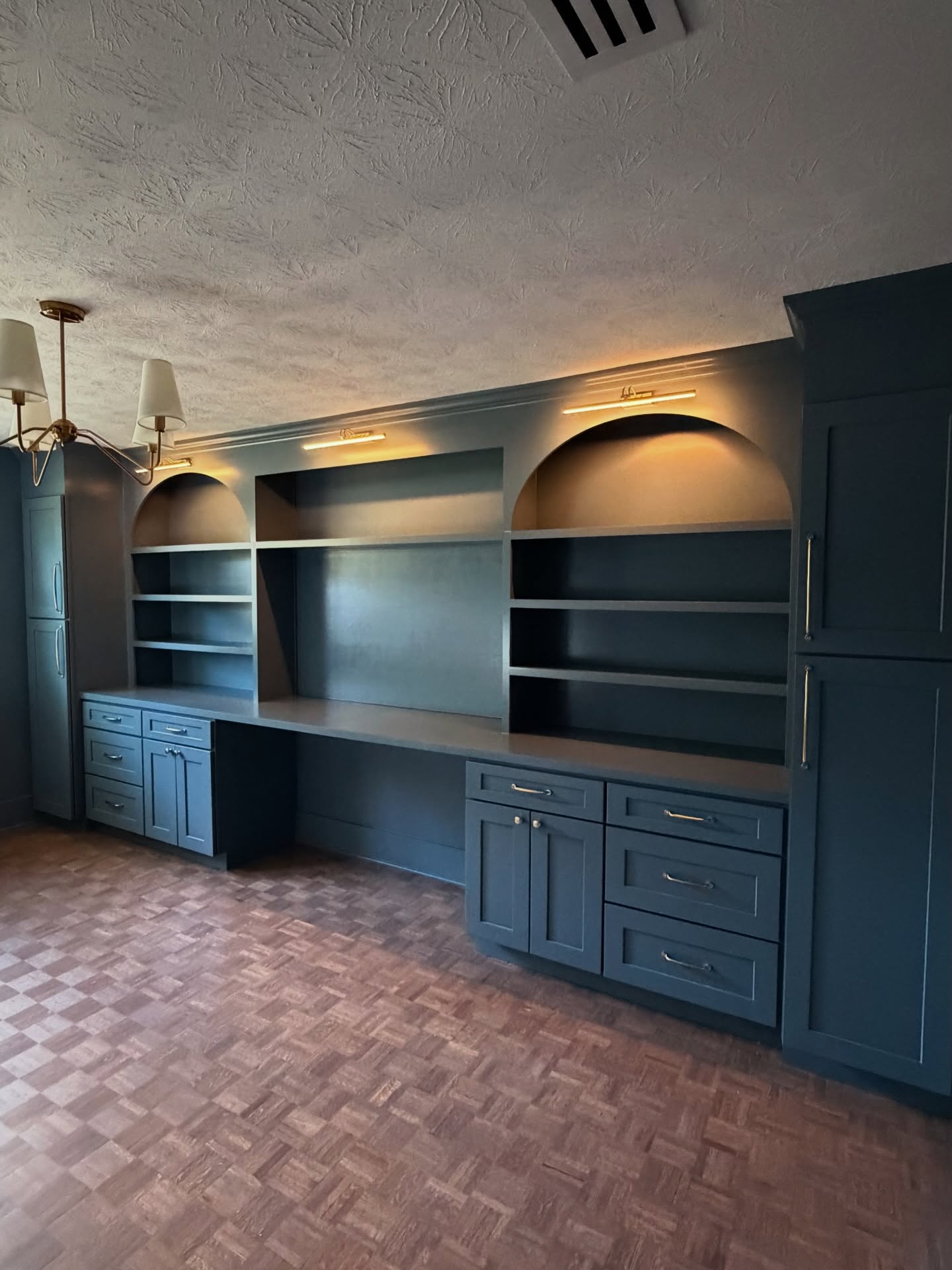 Home office wall of shelves and drawers by AVP Construction JAX — Jacksonville & St. John's County, FL