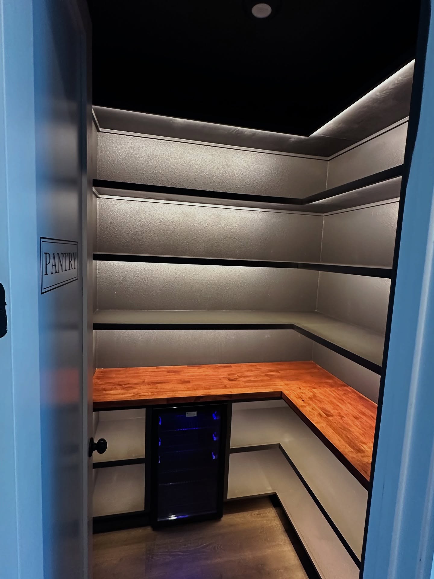 Custom walk-in pantry built-in by AVP Construction JAX — Jacksonville & St. John's County, FL
