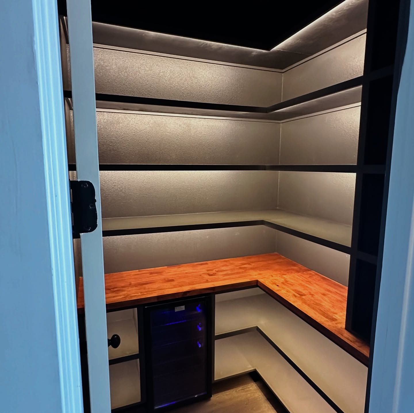 Modern pantry millwork with pull-out drawers by AVP Construction JAX — Jacksonville & St. John's County, FL