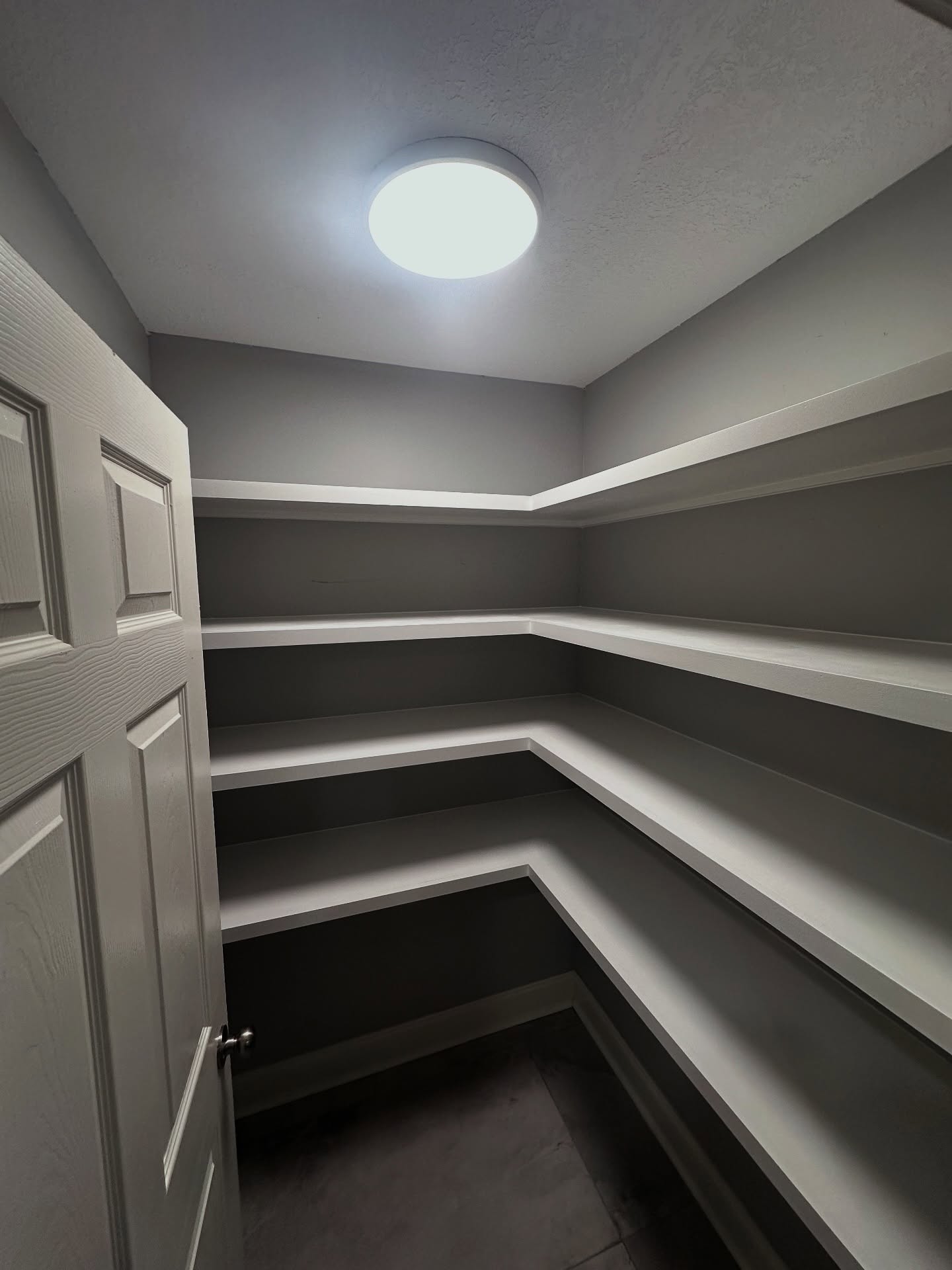 Butler's pantry with cabinets and counter by AVP Construction JAX — Jacksonville & St. John's County, FL