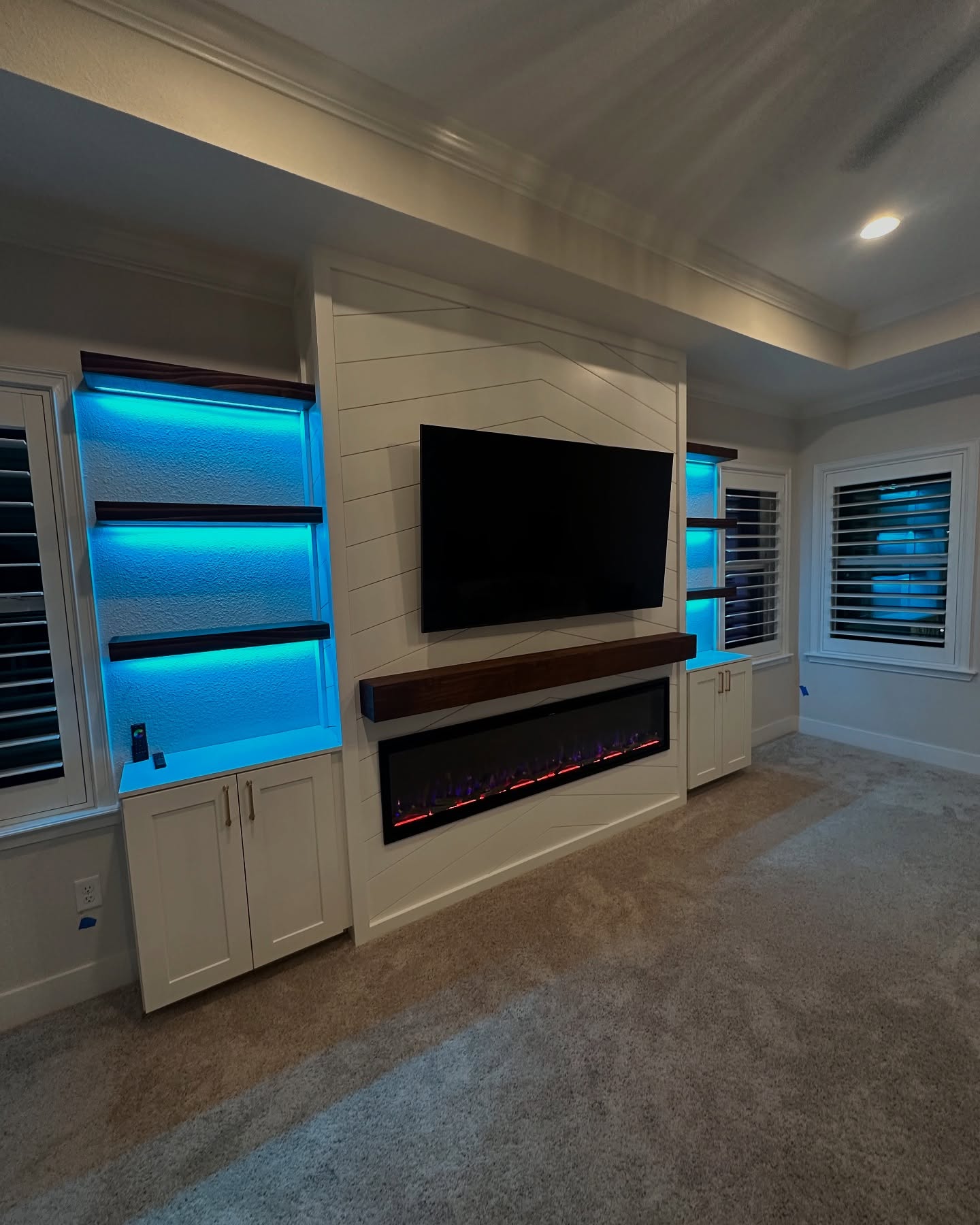 Custom TV entertainment center built-in by AVP Construction JAX — Jacksonville & St. John's County, FL