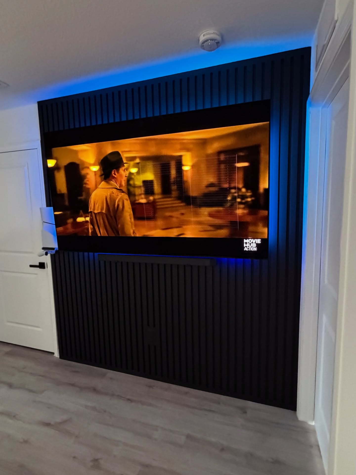 Slat-wall TV feature with hidden wiring by AVP Construction JAX — Jacksonville & St. John's County, FL