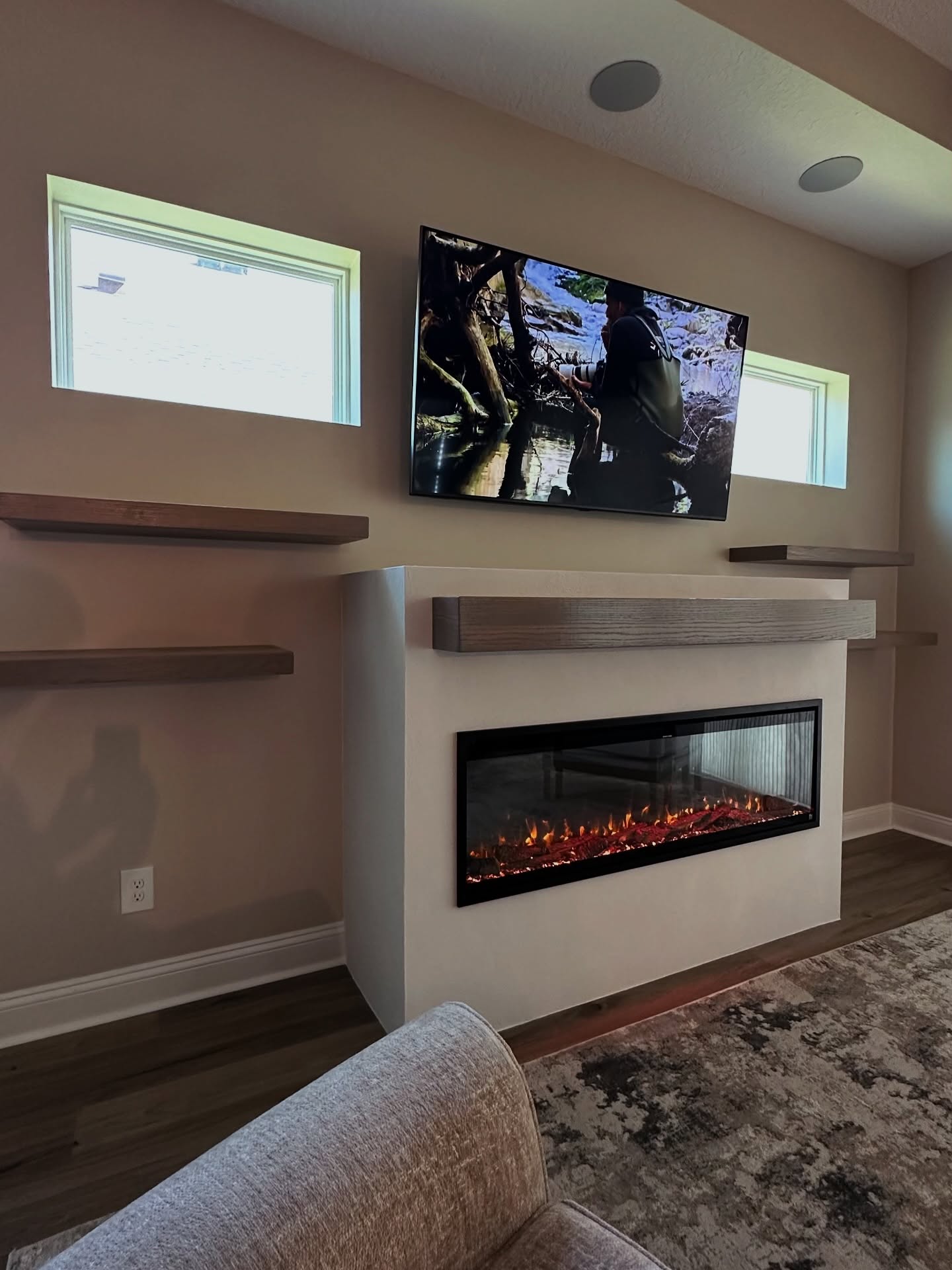 Custom TV entertainment center built-in by AVP Construction JAX — Jacksonville & St. John's County, FL