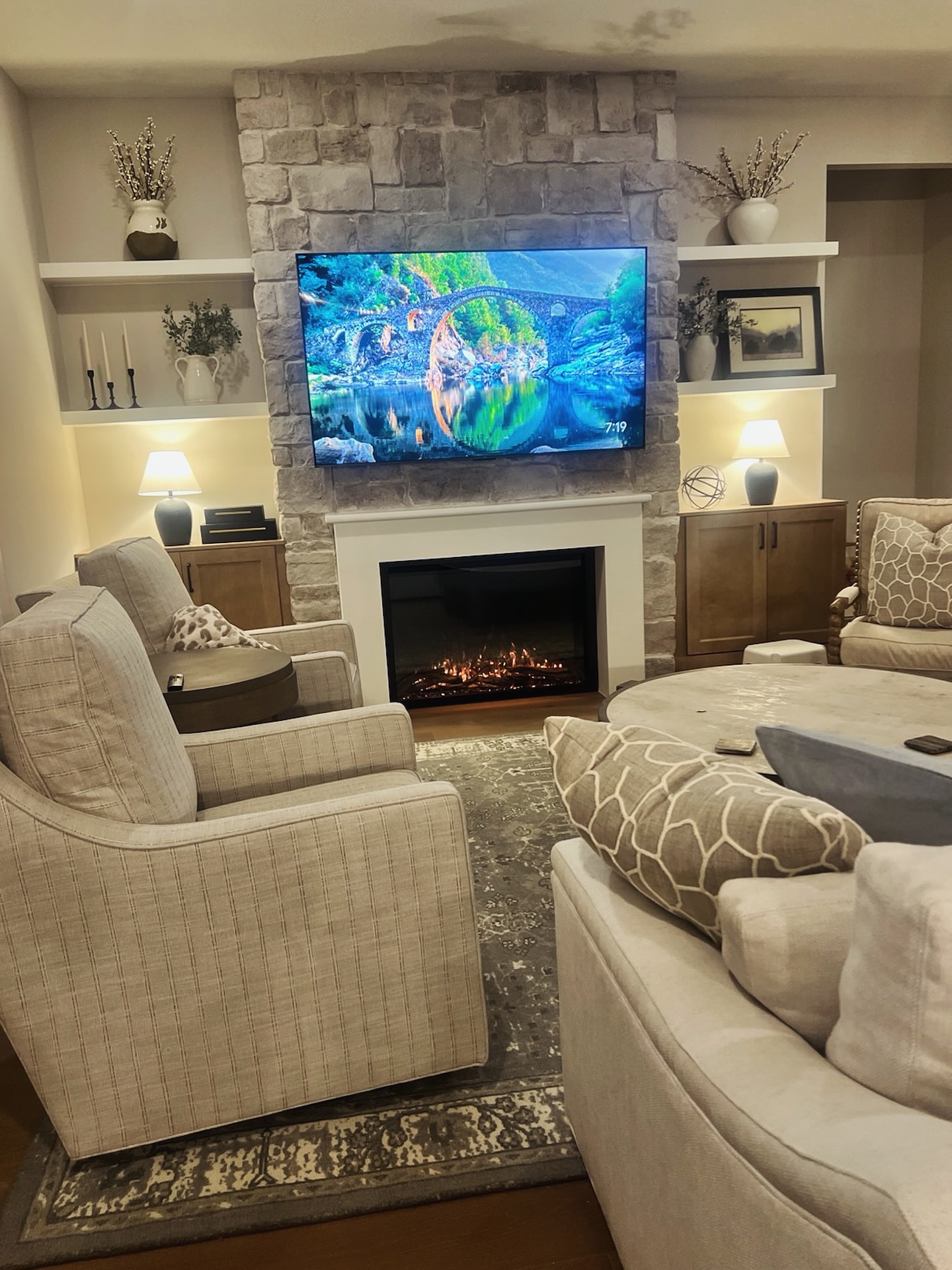 Modern entertainment center with electric fireplace by AVP Construction JAX — Jacksonville & St. John's County, FL