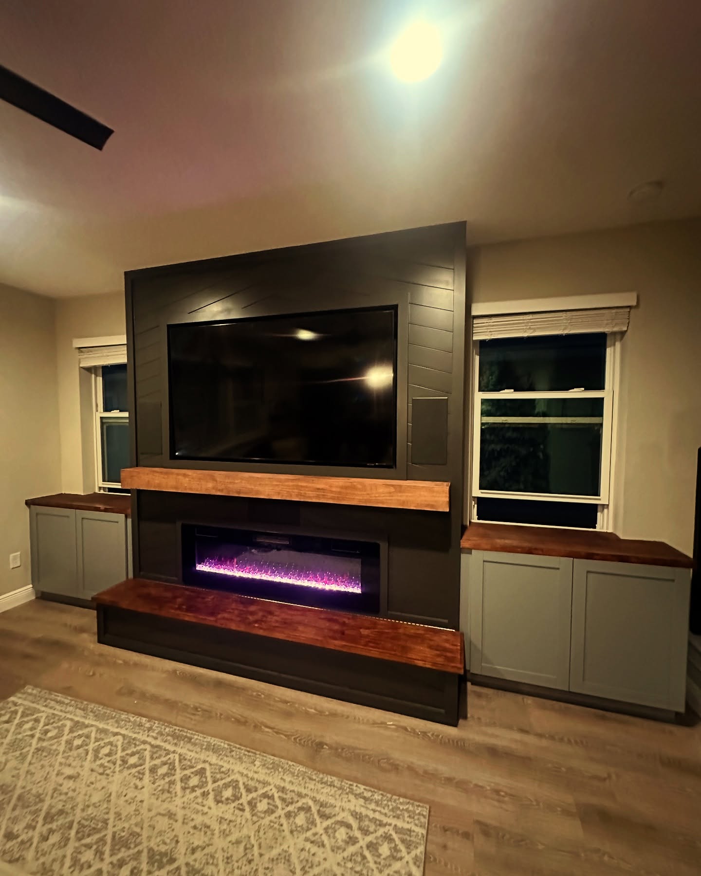 Floor-to-ceiling media wall with custom millwork by AVP Construction JAX — Jacksonville & St. John's County, FL