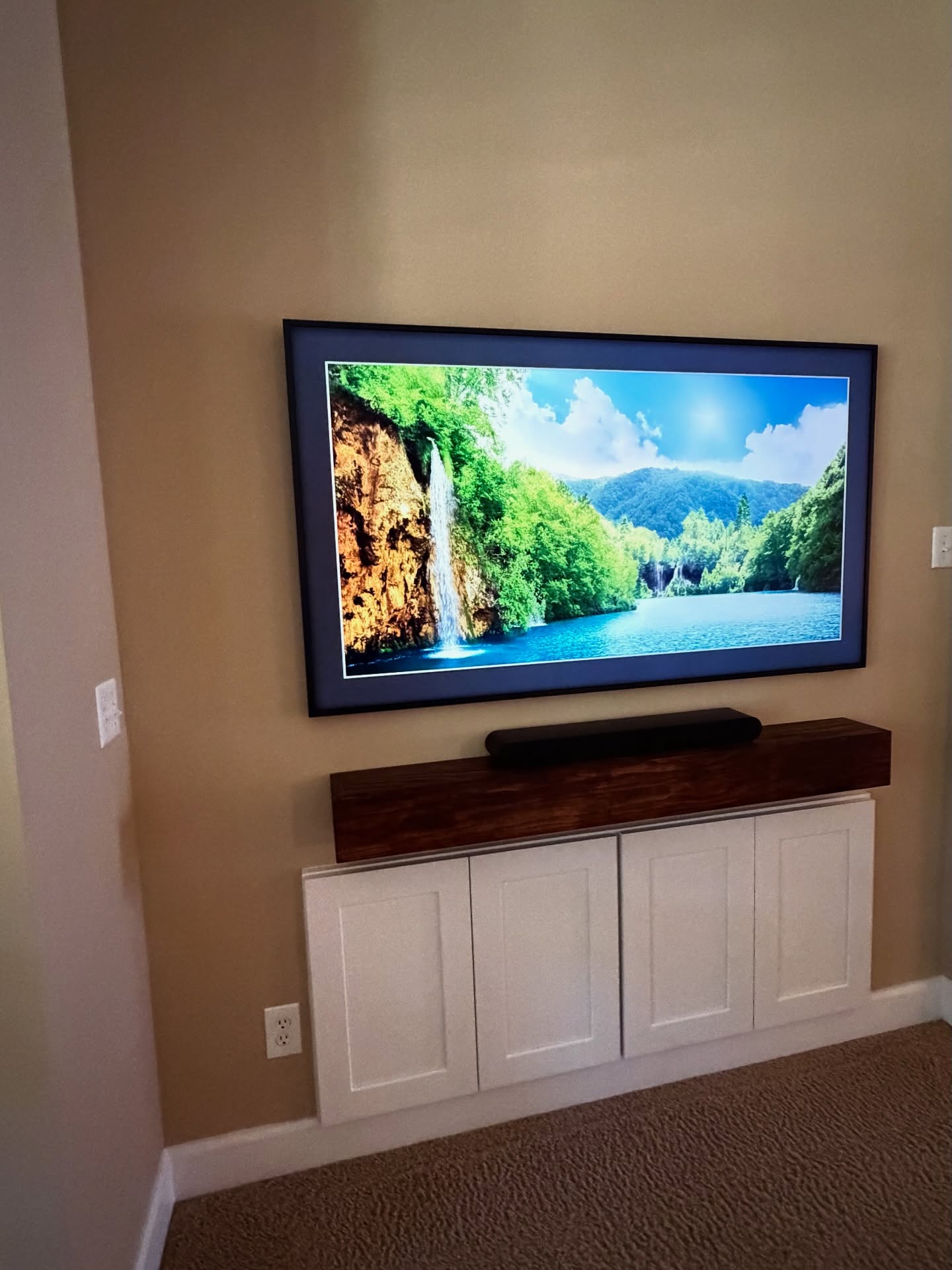 Floating-shelf TV built-in with shaker cabinets by AVP Construction JAX — Jacksonville & St. John's County, FL