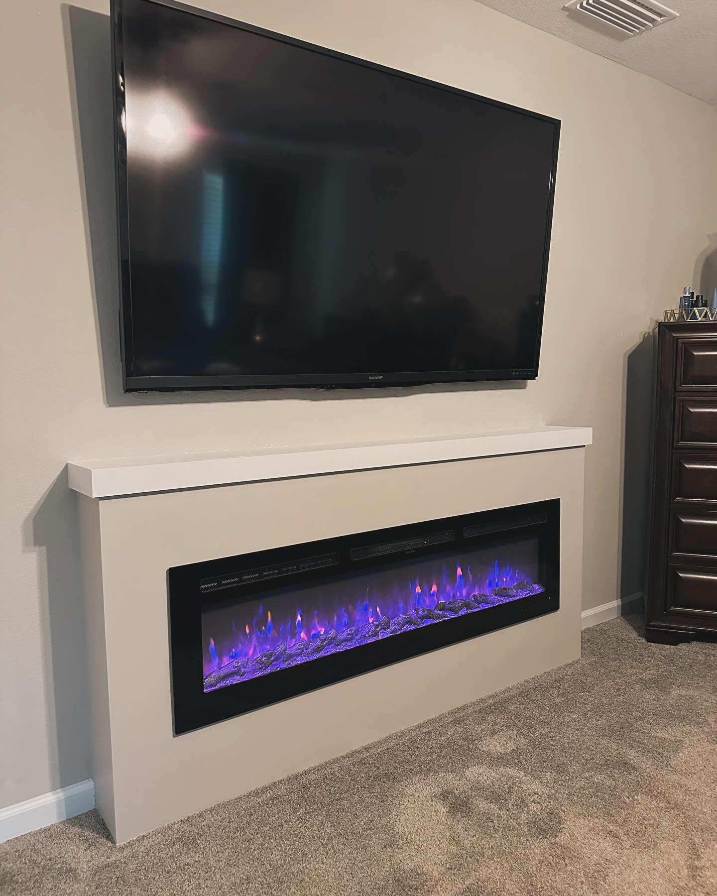Custom TV entertainment center built-in by AVP Construction JAX — Jacksonville & St. John's County, FL