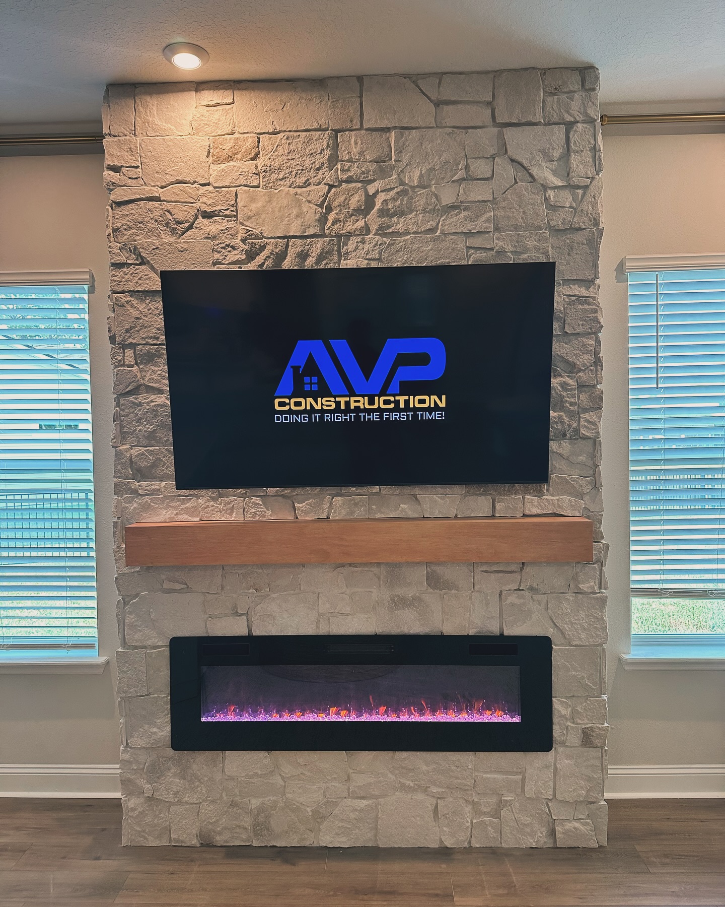 Custom living-room media wall with paneling by AVP Construction JAX — Jacksonville & St. John's County, FL