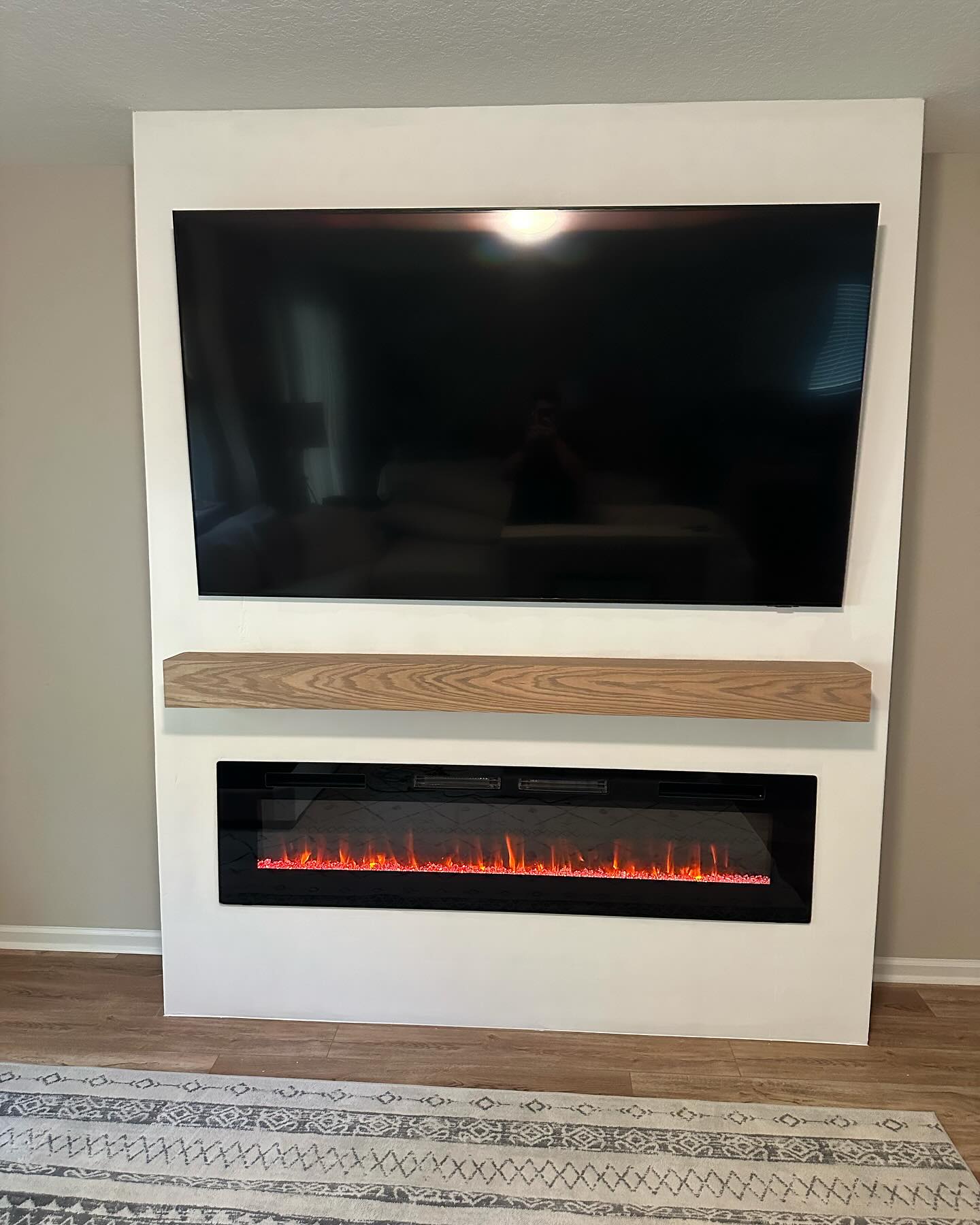 Custom TV entertainment center built-in by AVP Construction JAX — Jacksonville & St. John's County, FL