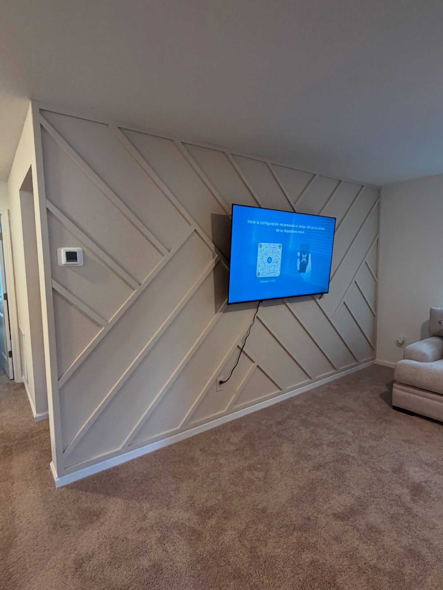 Built-in TV cabinet flanked by display shelving by AVP Construction JAX — Jacksonville & St. John's County, FL