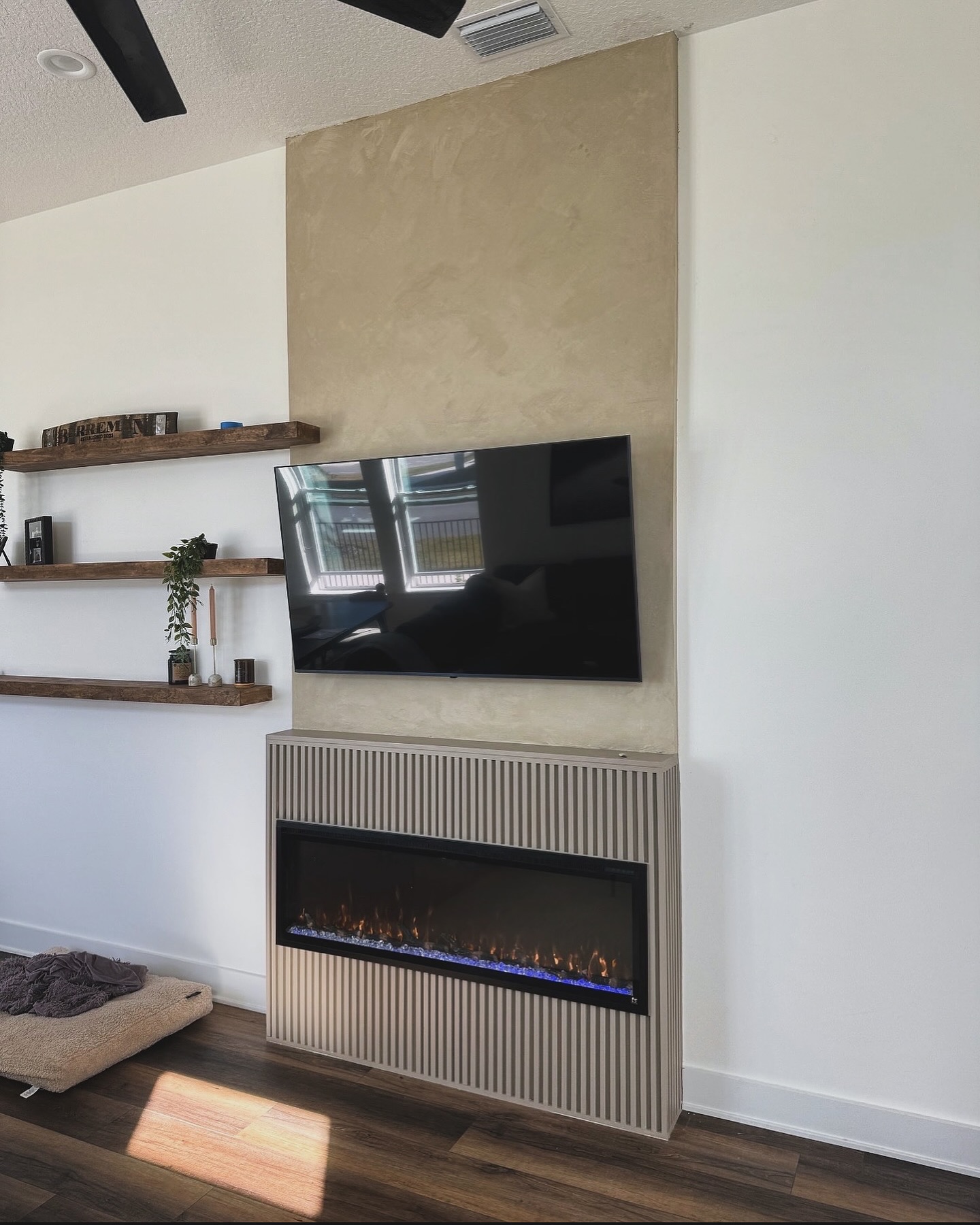 Custom living-room media wall with paneling by AVP Construction JAX — Jacksonville & St. John's County, FL