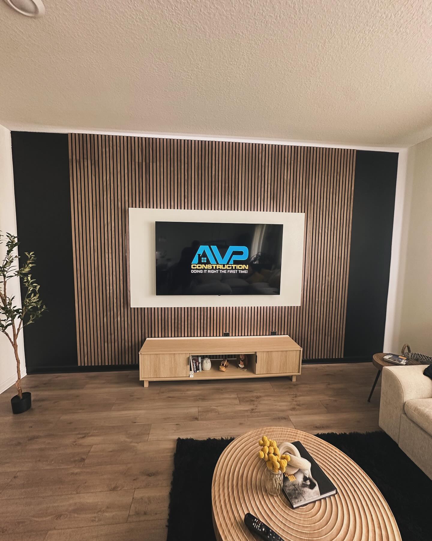 Slat-wall TV feature with hidden wiring by AVP Construction JAX — Jacksonville & St. John's County, FL
