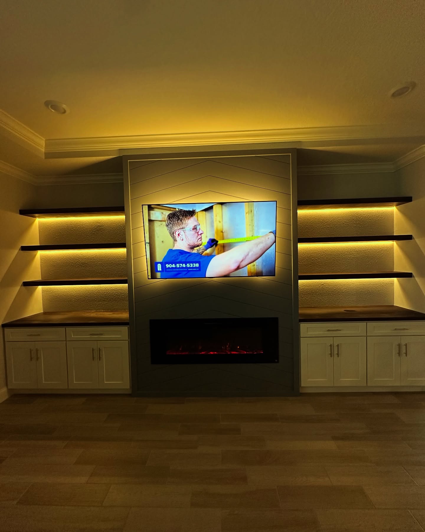 Slat-wall TV feature with hidden wiring by AVP Construction JAX — Jacksonville & St. John's County, FL