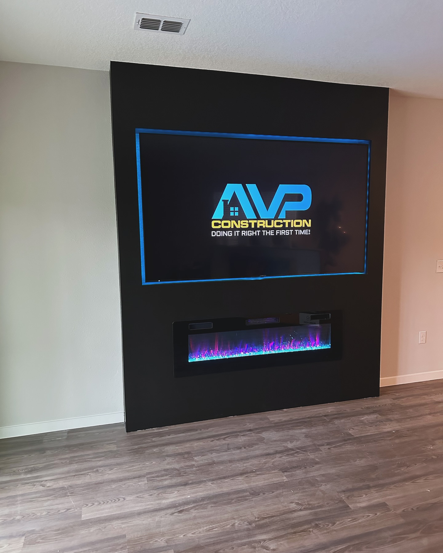 Custom TV entertainment center built-in by AVP Construction JAX — Jacksonville & St. John's County, FL