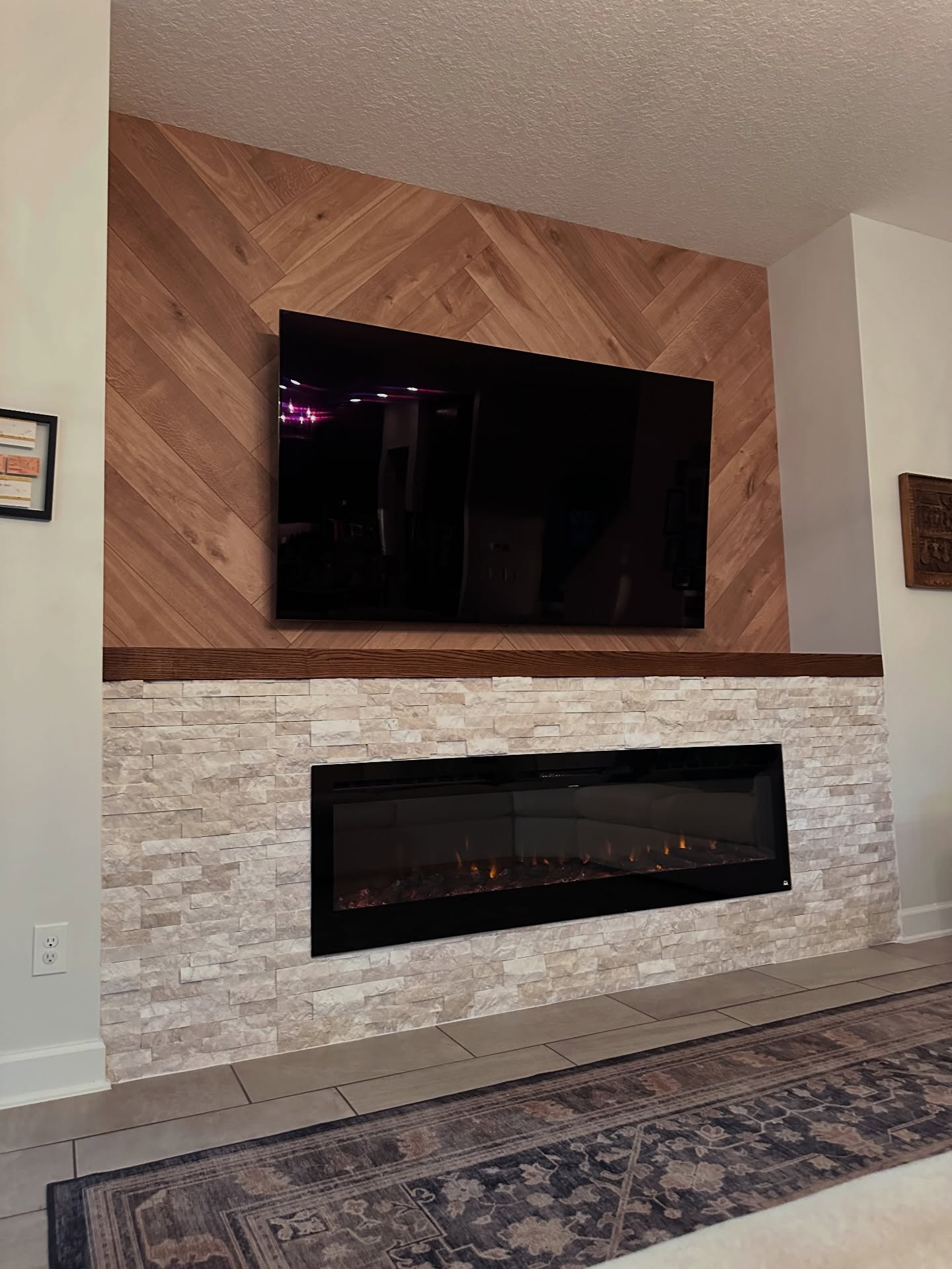 Floor-to-ceiling media wall with custom millwork by AVP Construction JAX — Jacksonville & St. John's County, FL