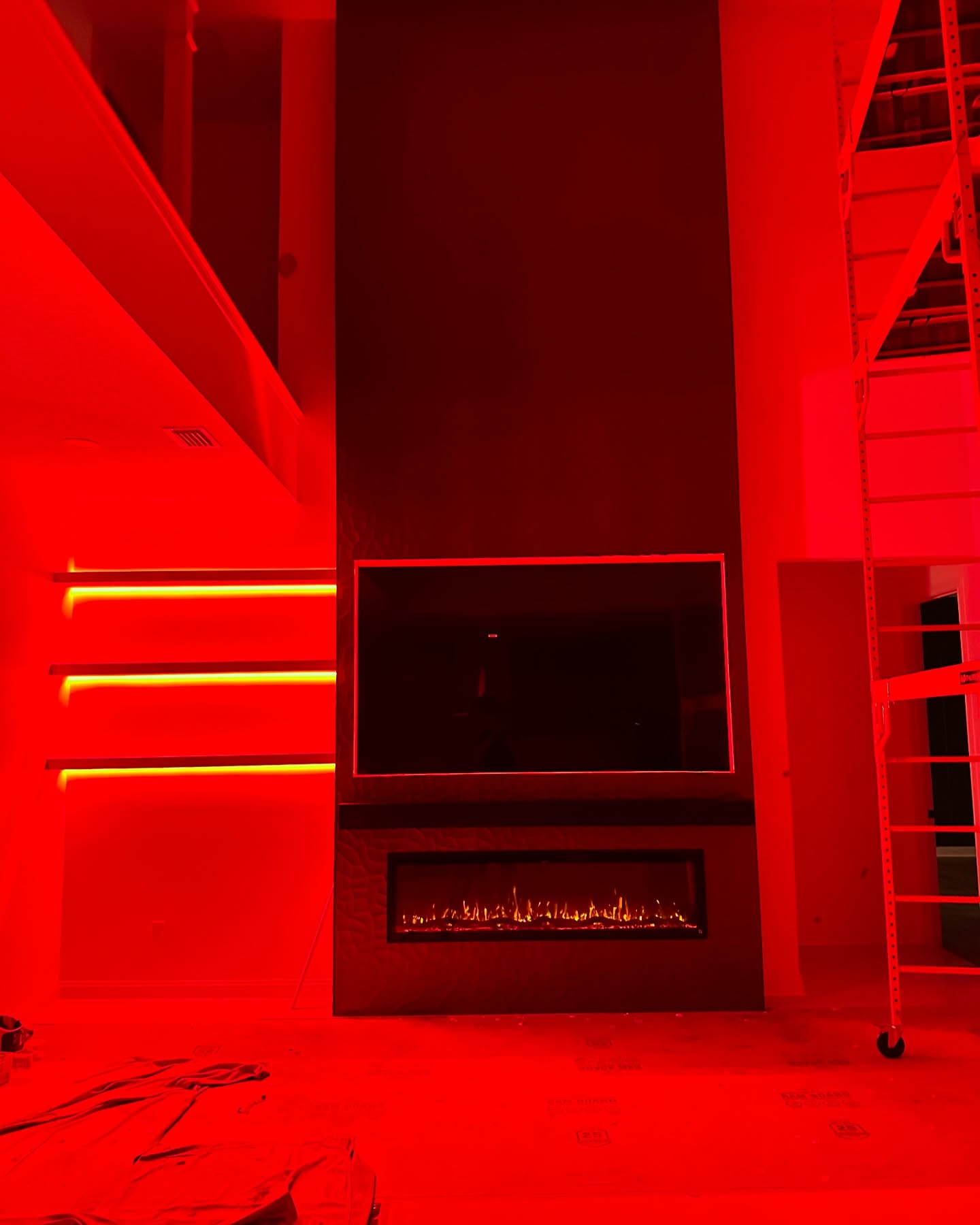 Built-in TV cabinet flanked by display shelving by AVP Construction JAX — Jacksonville & St. John's County, FL